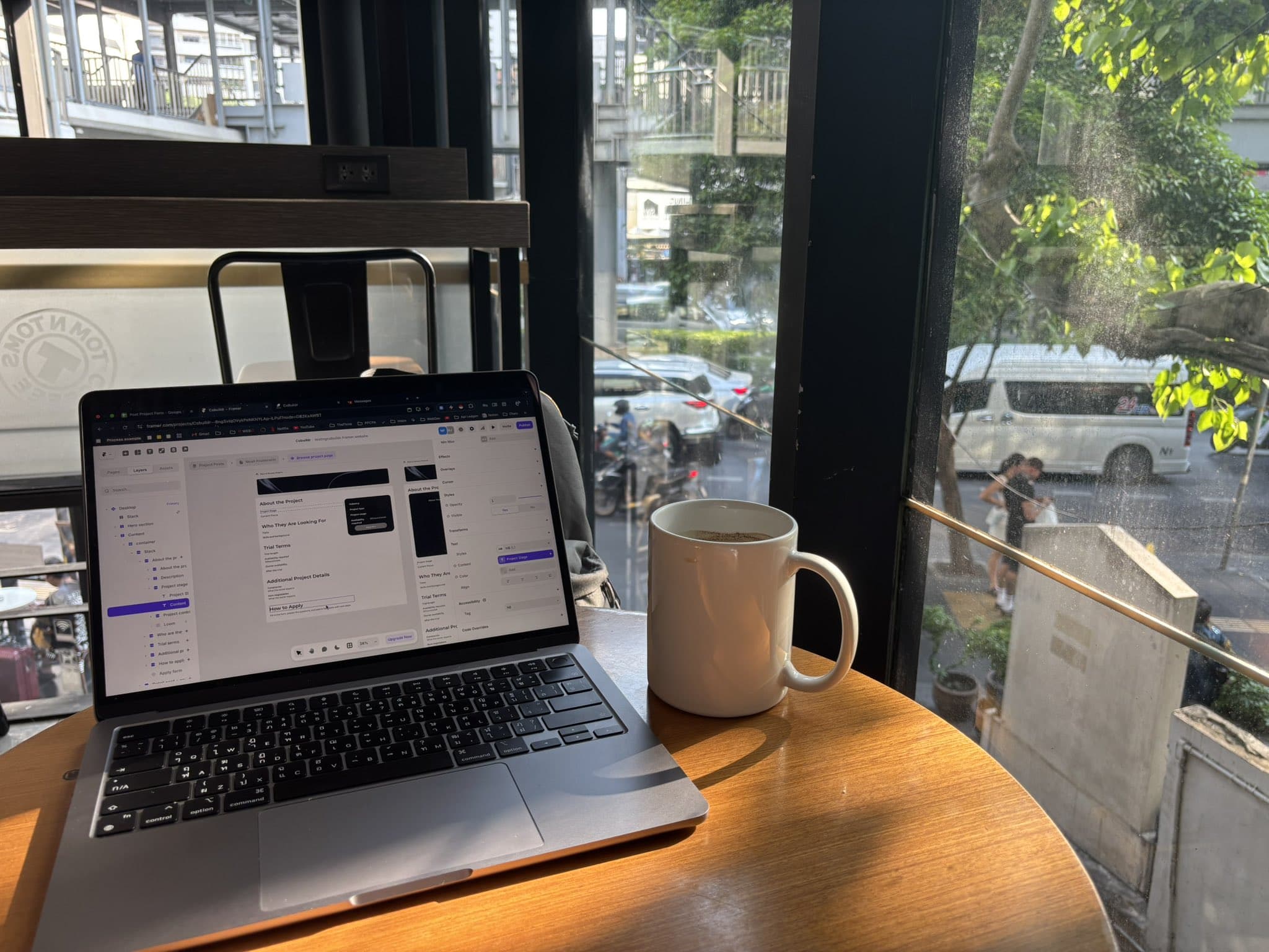 Working on CoBuildr project at a cafe in Bangkok.