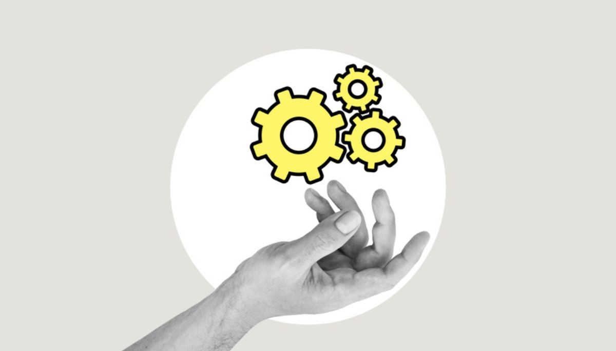Stylized image of gears above a hand, used to depict building reliable, long‑lasting APIs.