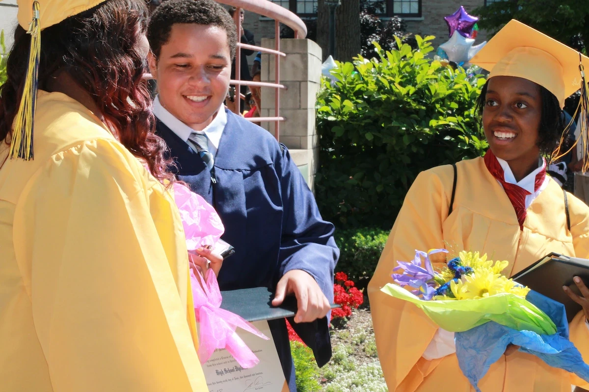 Buffalo Academy of Science seniors celebrating high school graduation