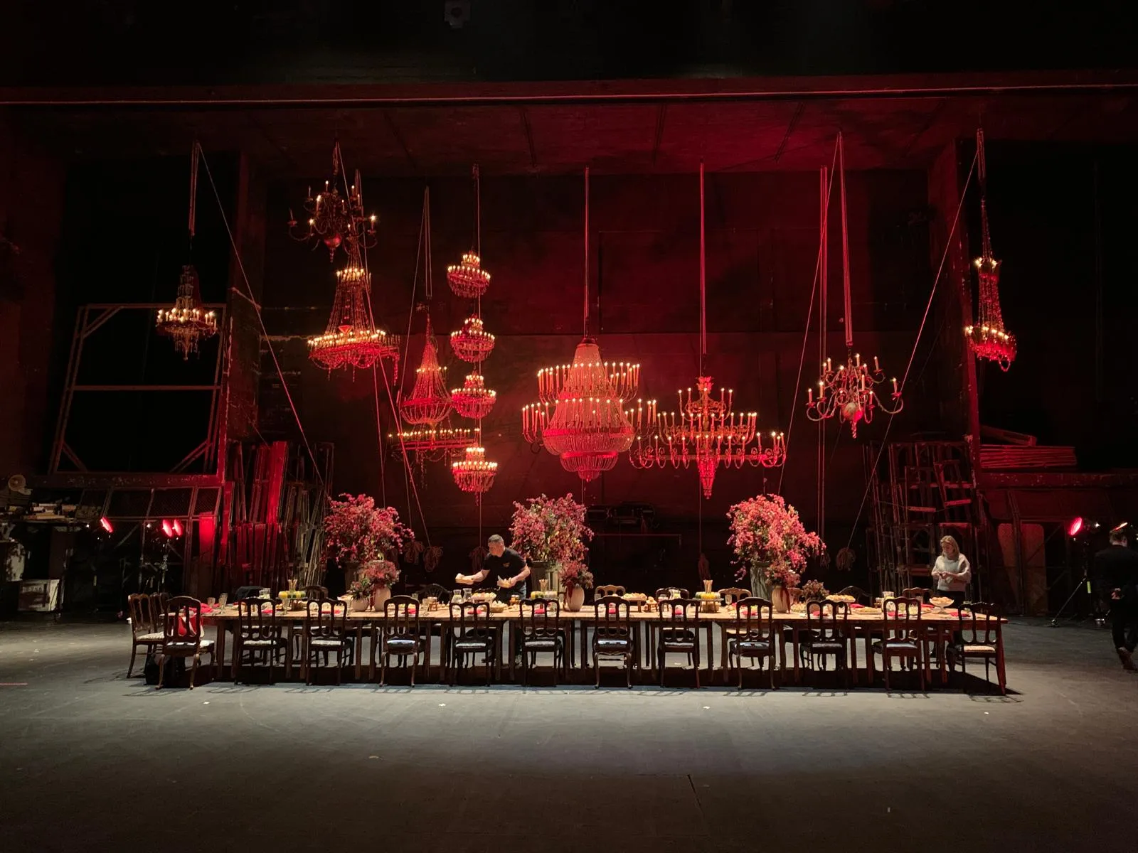 ORLEN Art & Science press conference, set design with chandeliers and a table for journalists