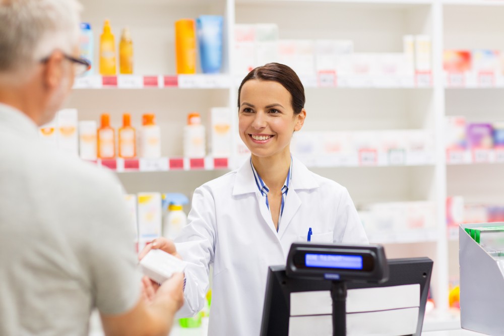 Pharmacist talking to patient