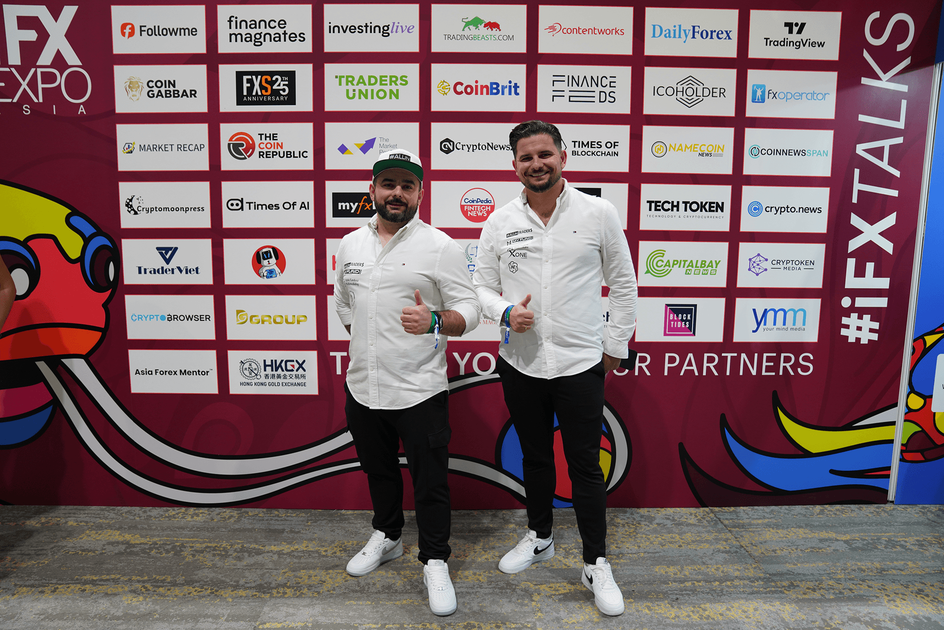 An orange cube-shaped side table is shown.