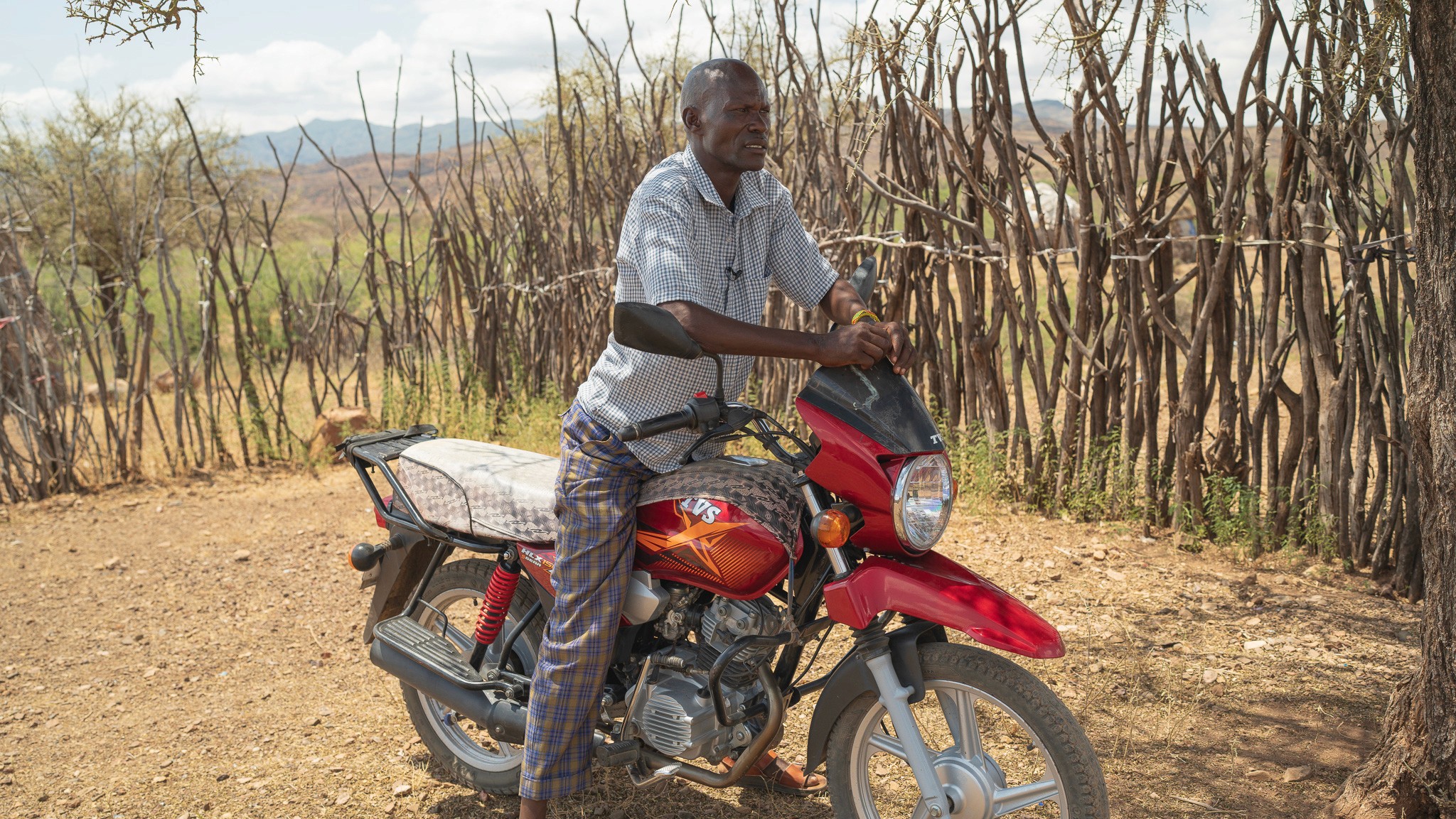 a black and white living room with a large tv