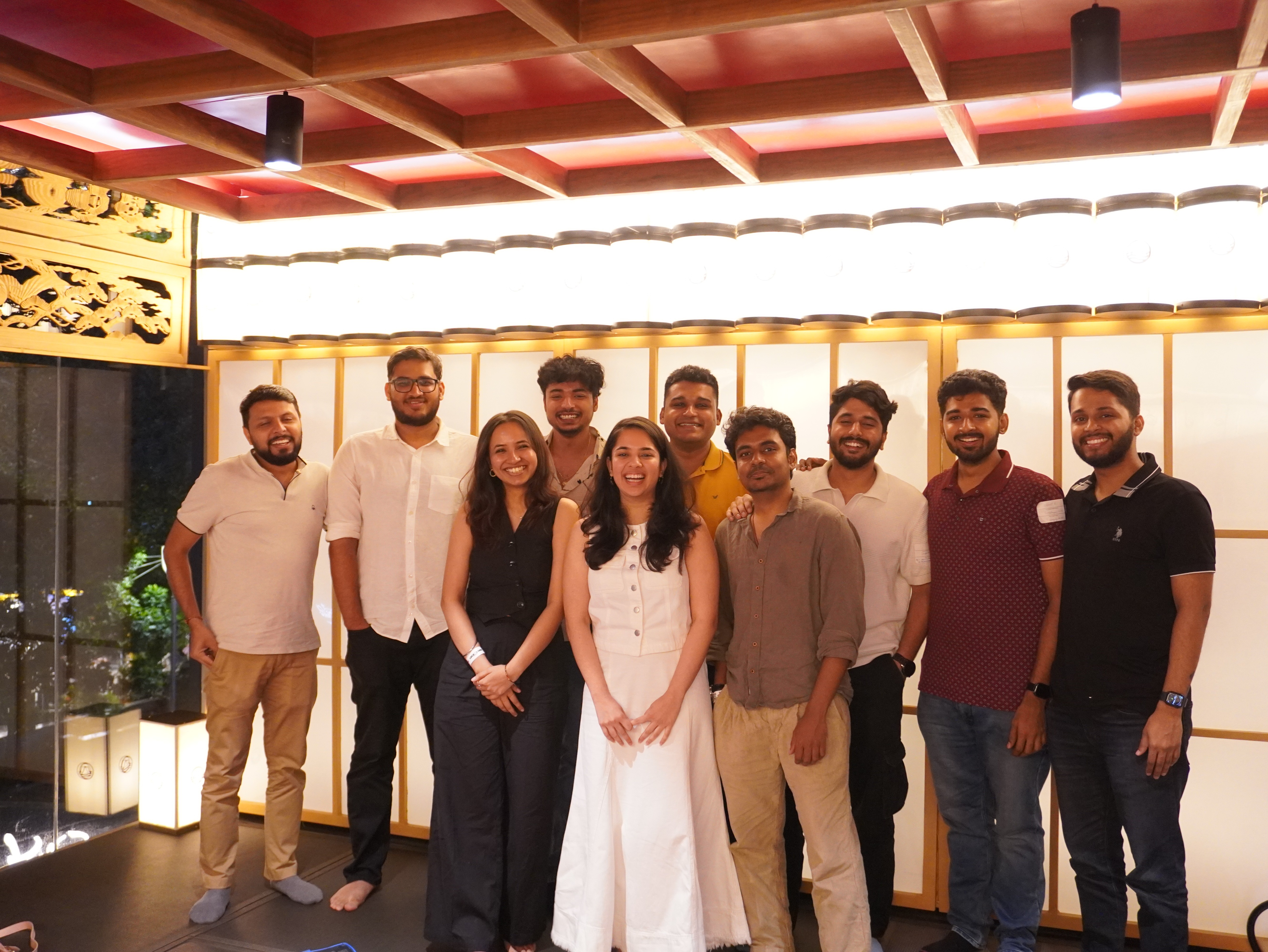 A man standing with Sufboard