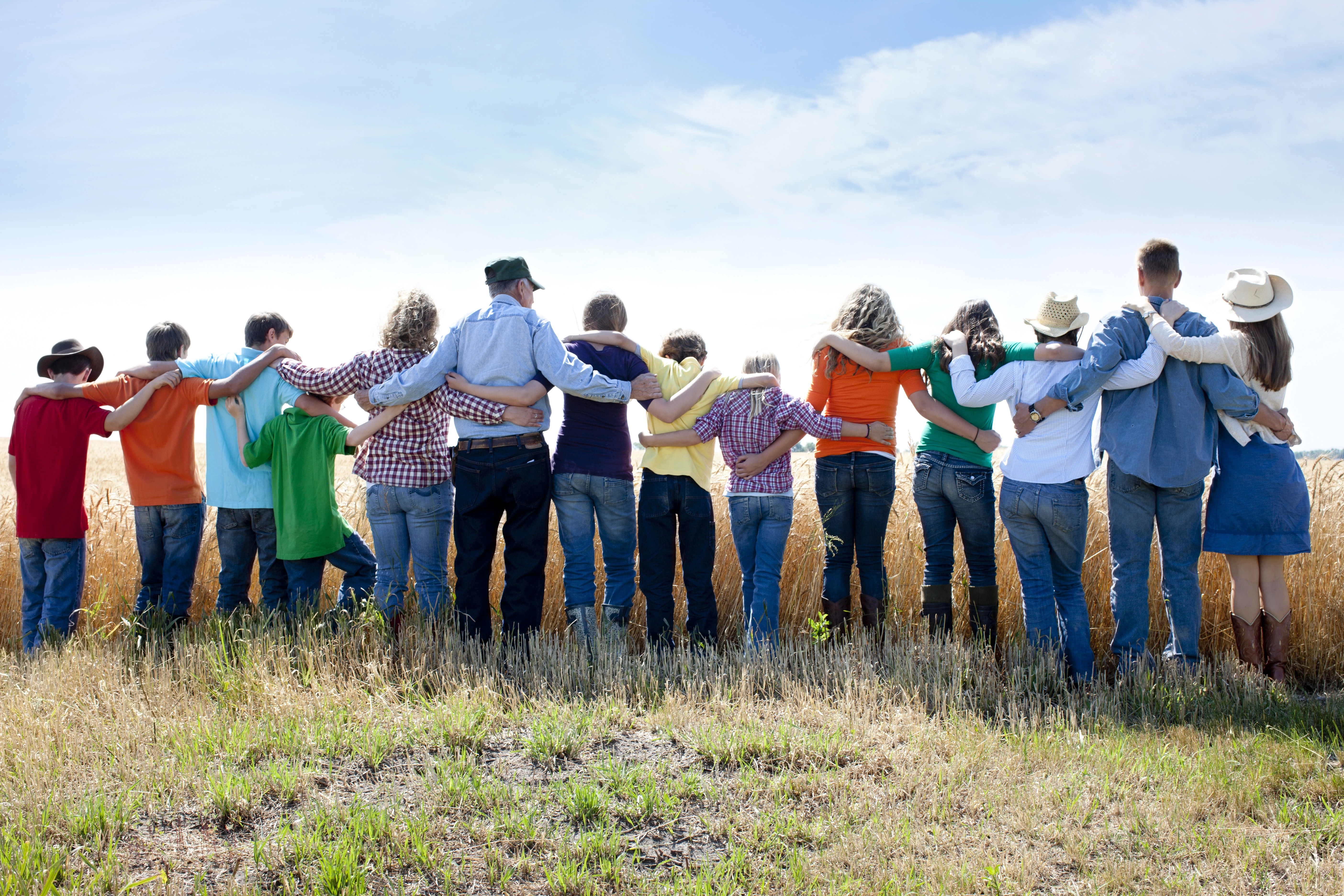 Values shared by family and friends joining arms