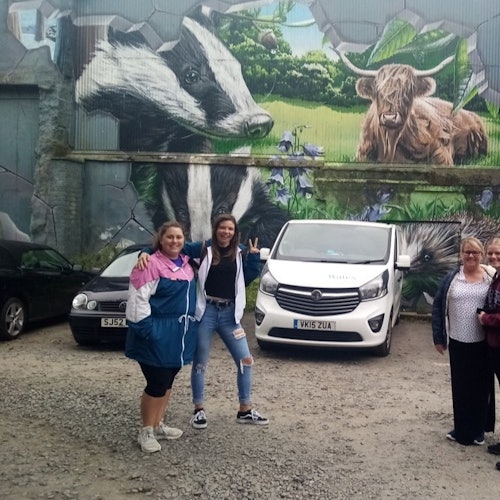 A group enjoying the Glasgow Street Art Tour