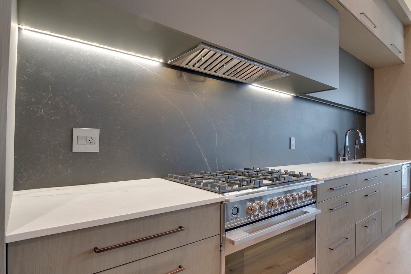 Side view of modern kitchen with full-height cabinets