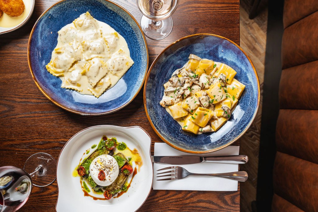 mantu served in a white plate