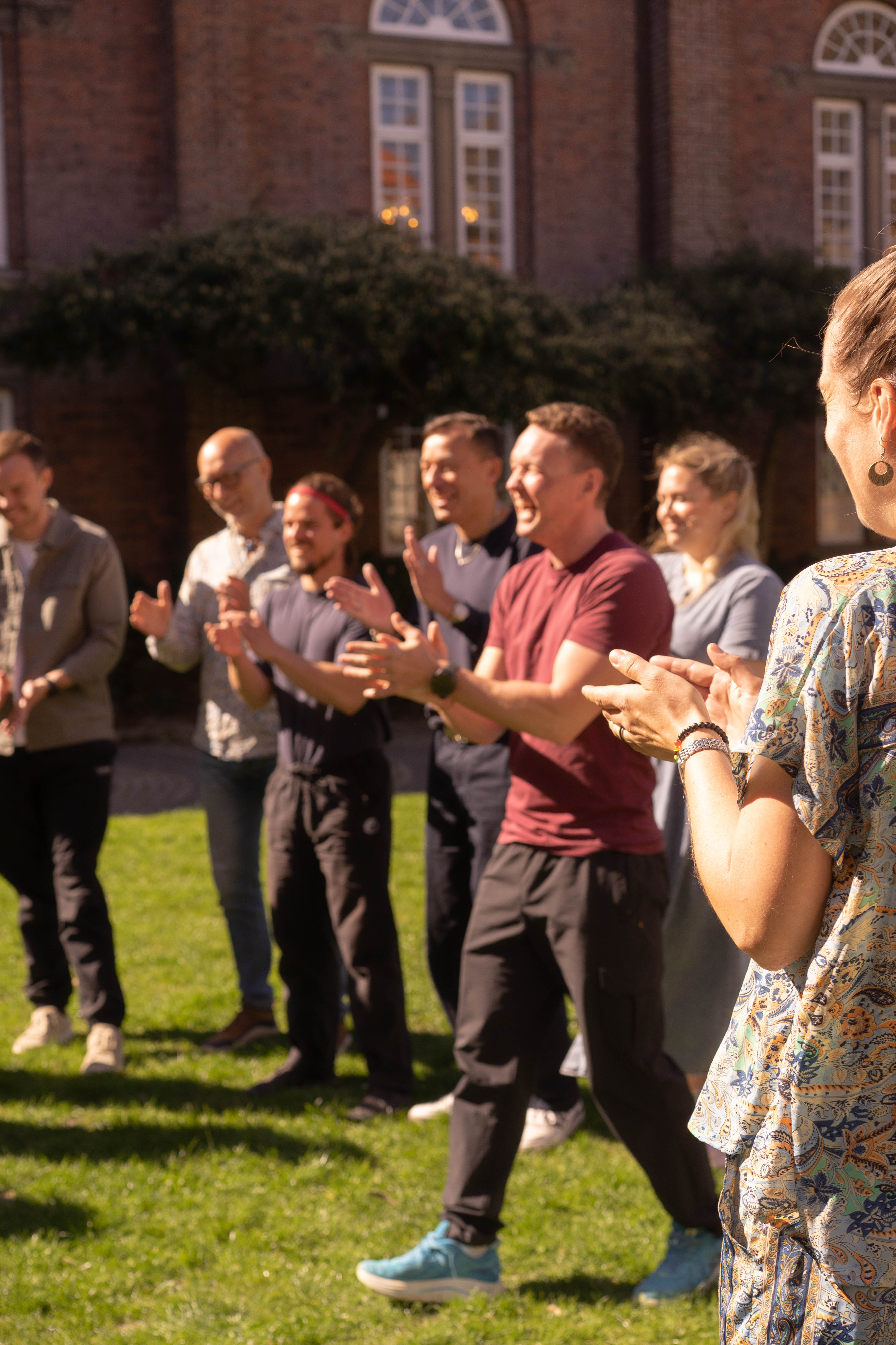 GROW.Lab members taking part in a facilitated group exercise outdoors.