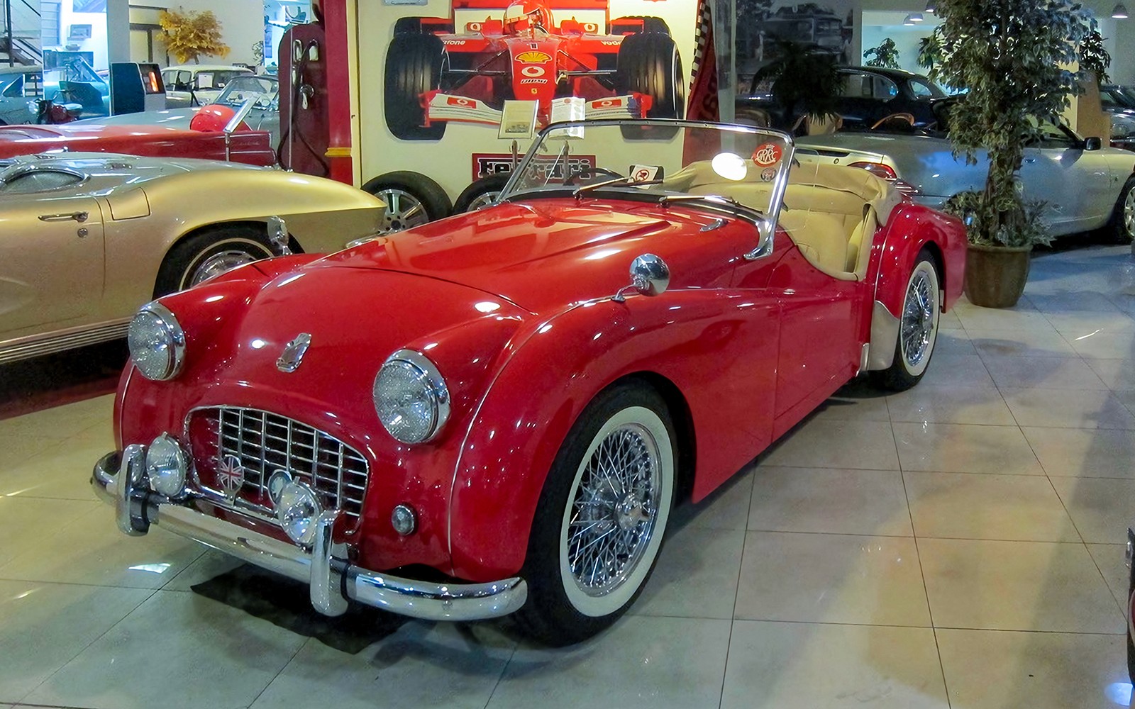Red vintage convertible car at Malta Classic Car Collection Museum.