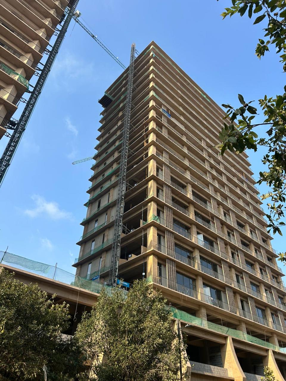 a building with wavy lines on it against a blue sky