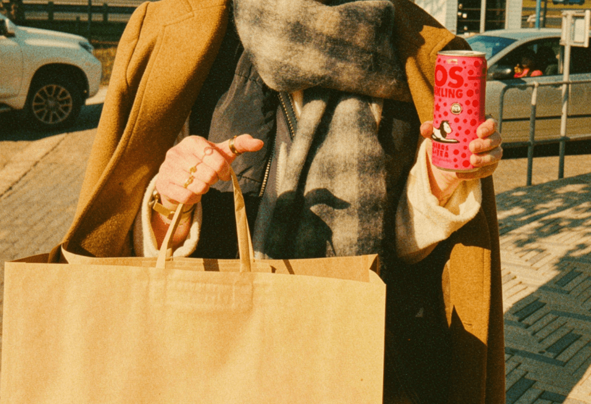 A wrapped gift with a gold ribbon — the whole point of a wishlist
