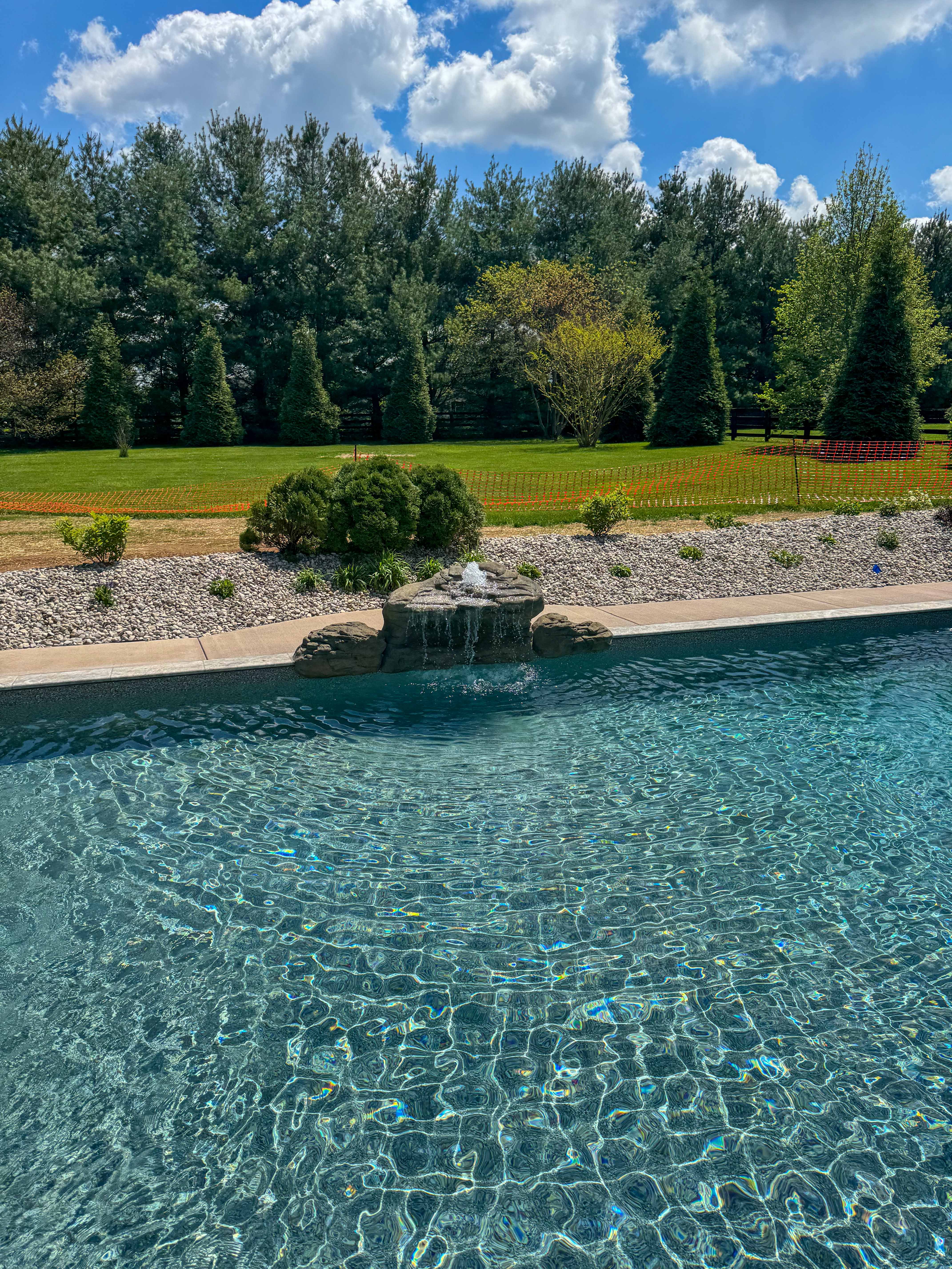 fountain addition to a fiberglass pool installation