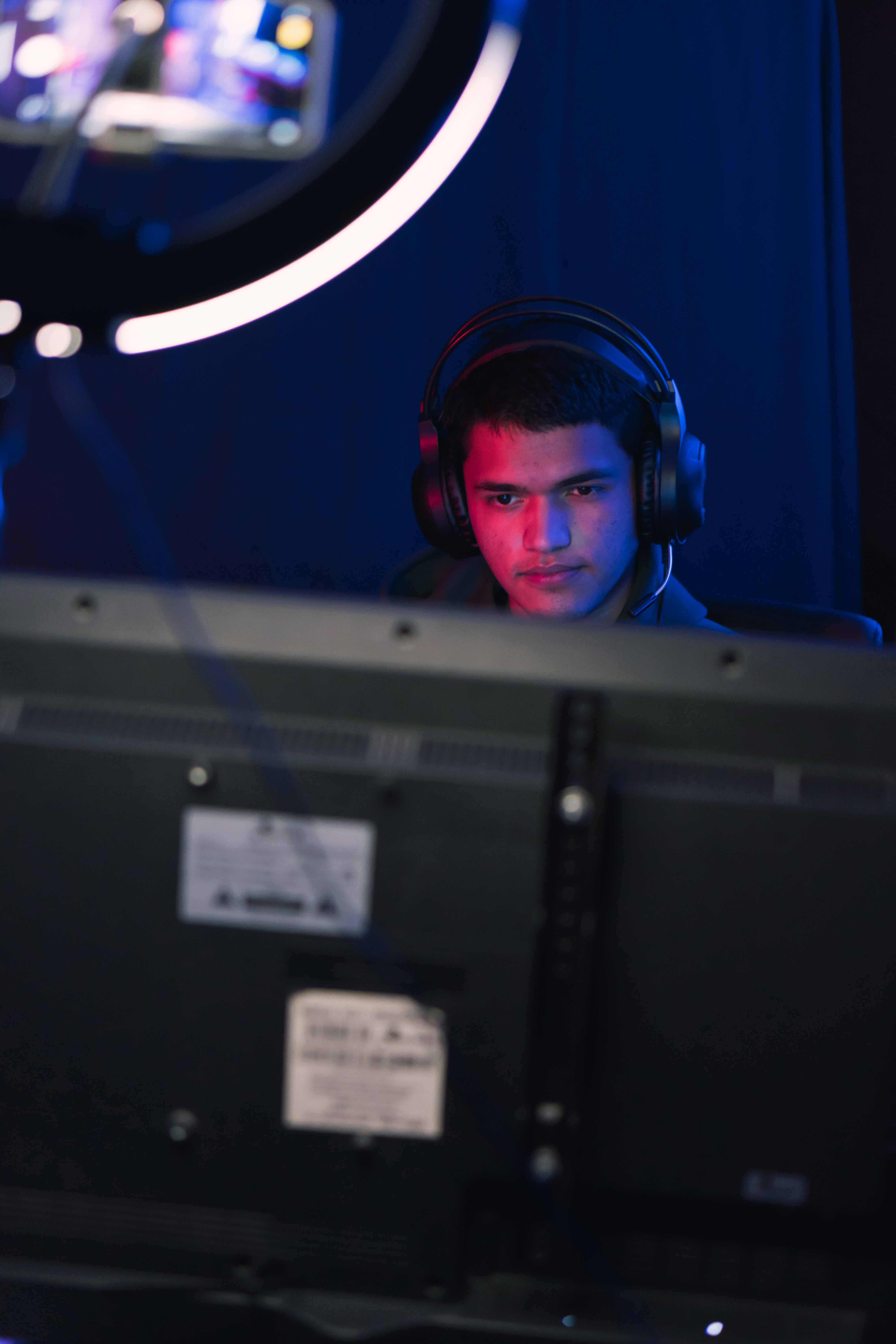 An Indian male playign online games and solving puzzles