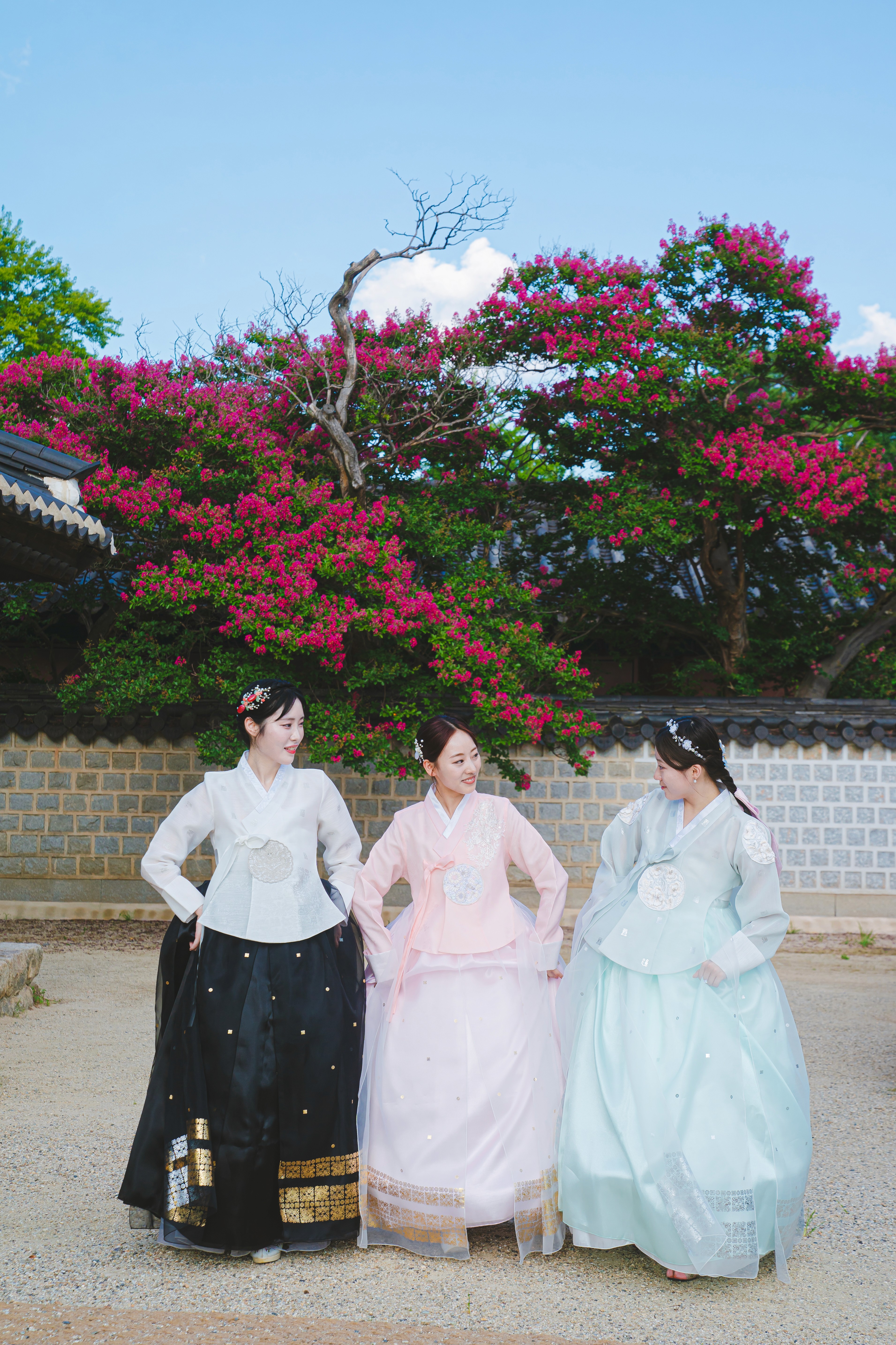 a group of buildings with a sky background