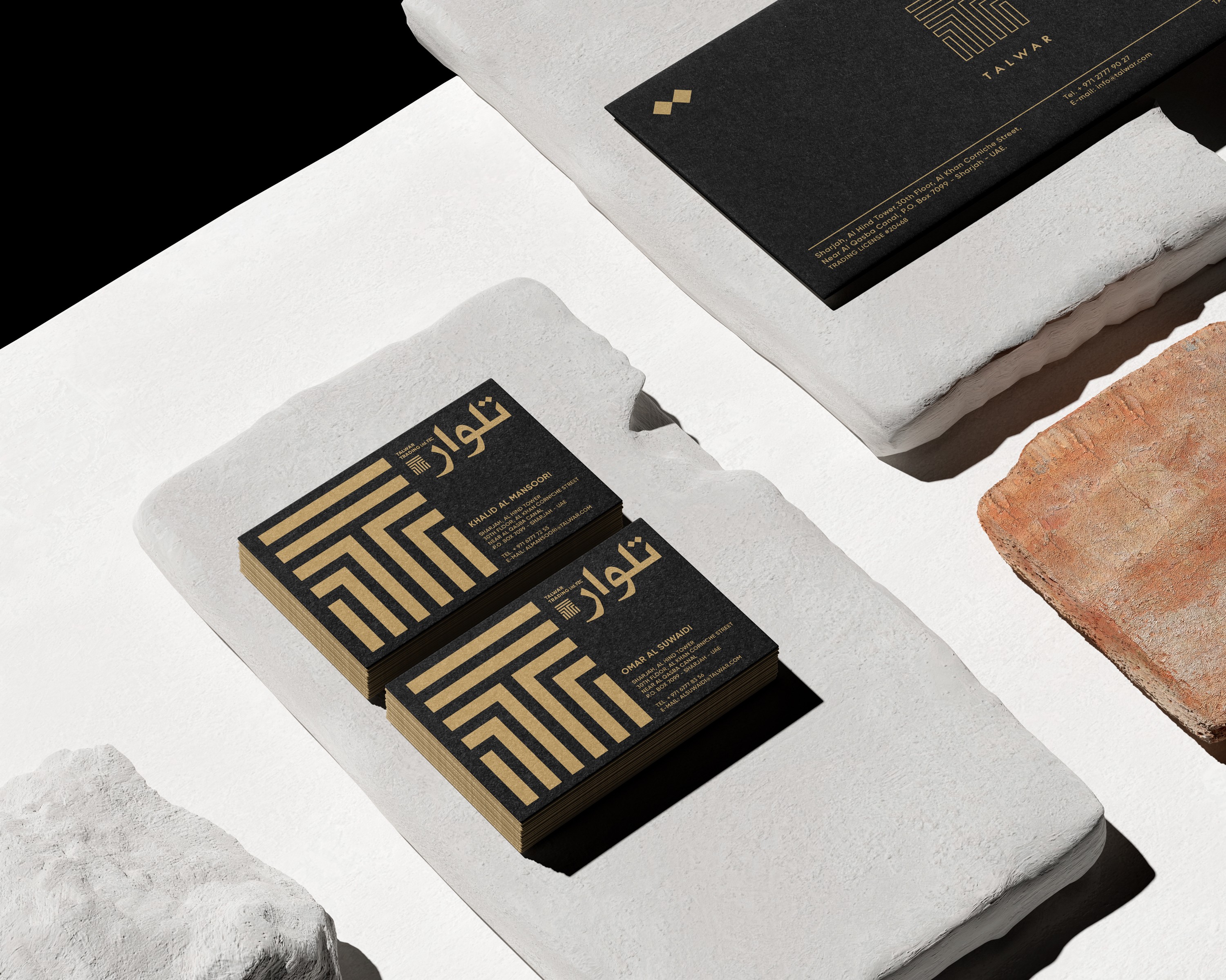 Batch.Works logo over a photo of a box of 3D printed objects