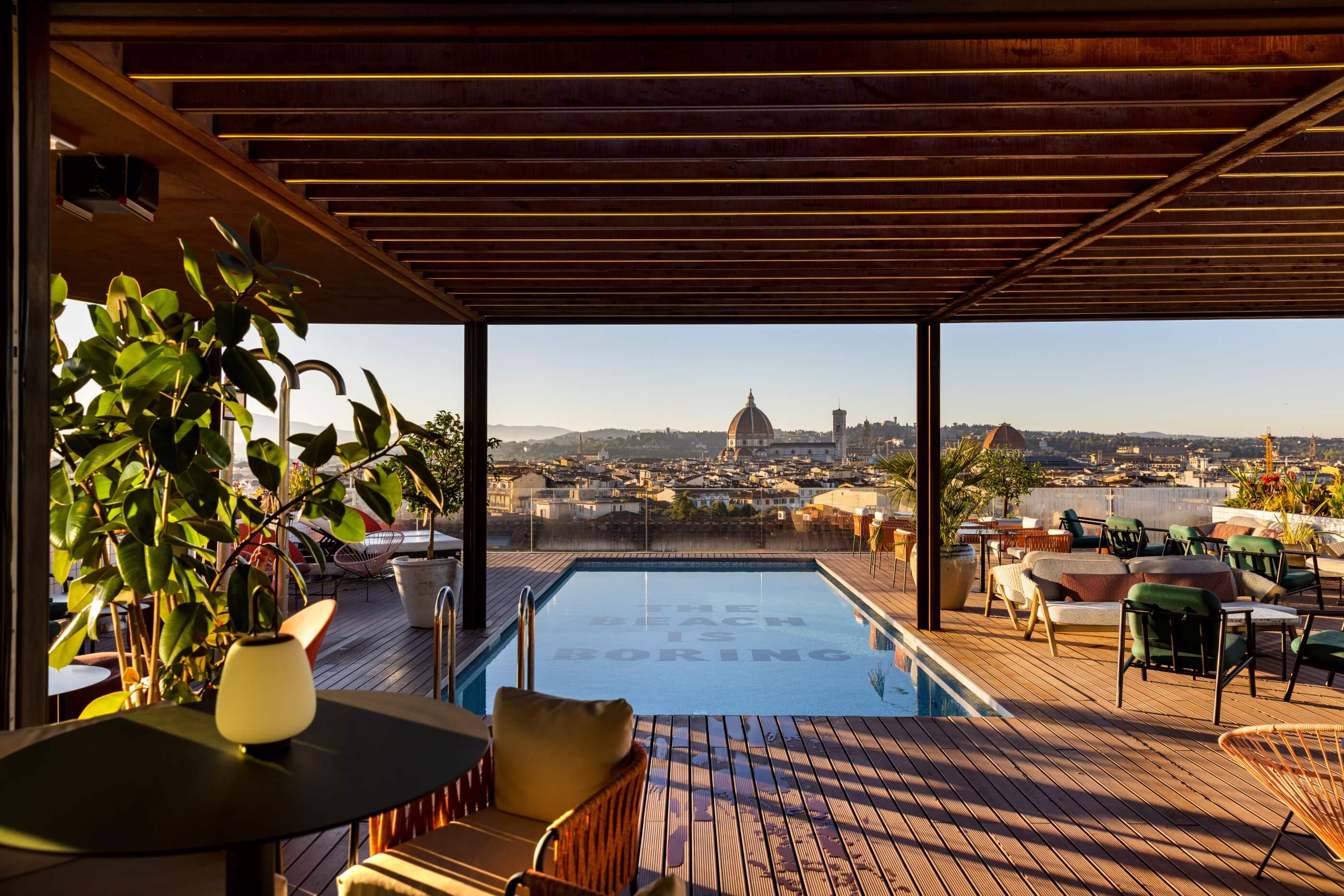 Streetside billboard with flyposters of the Batch.Works brand and illustrations