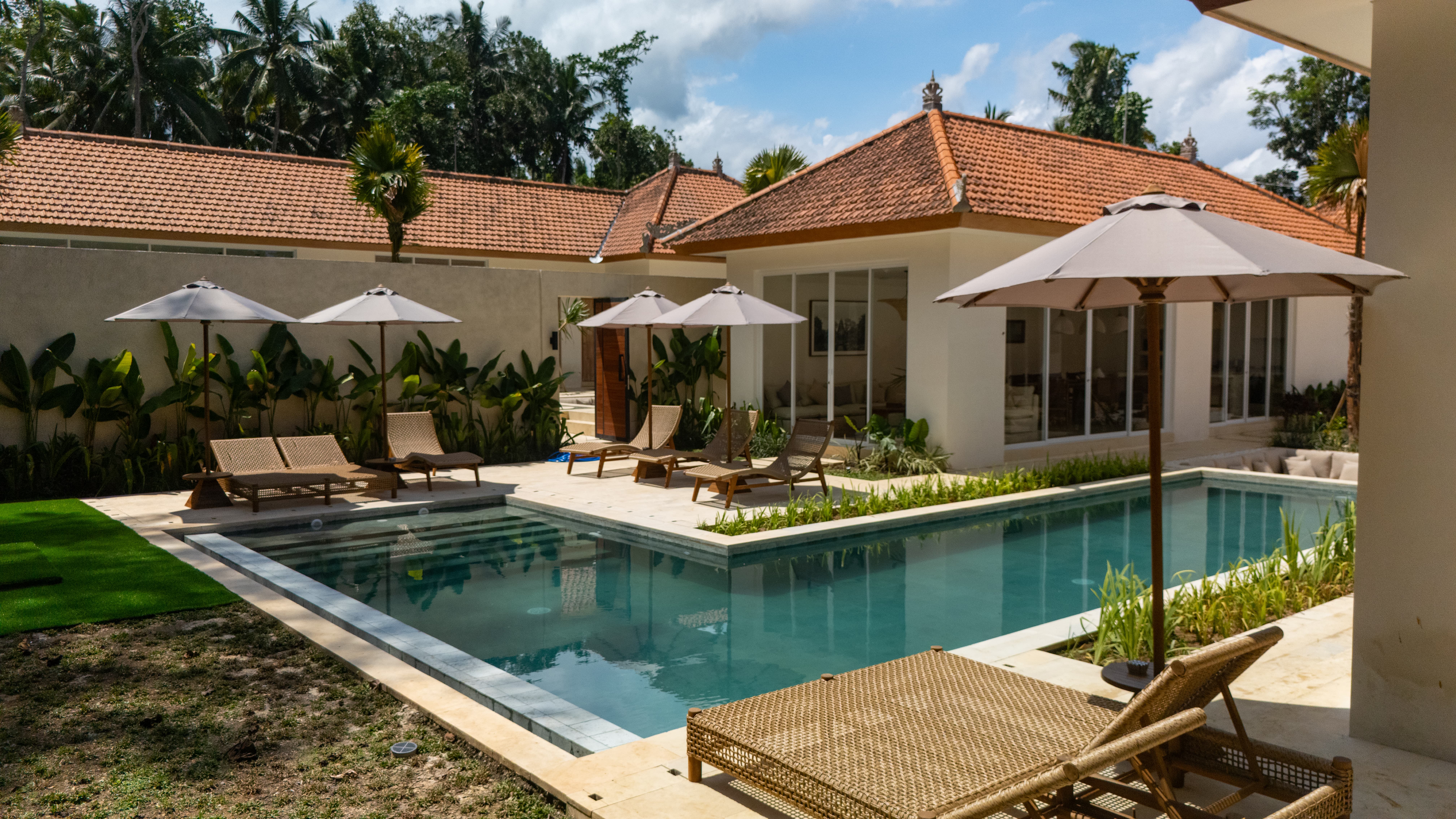 a woman wearing a black coat and a white scarf