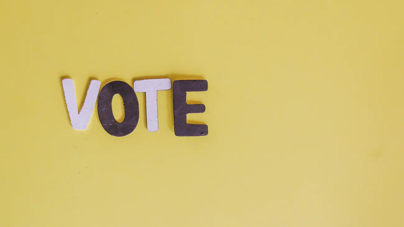 The word “VOTE” displayed on a yellow background, representing MVP and Fair Play voting, audience participation and interactive sponsorship activations at sports tournaments.