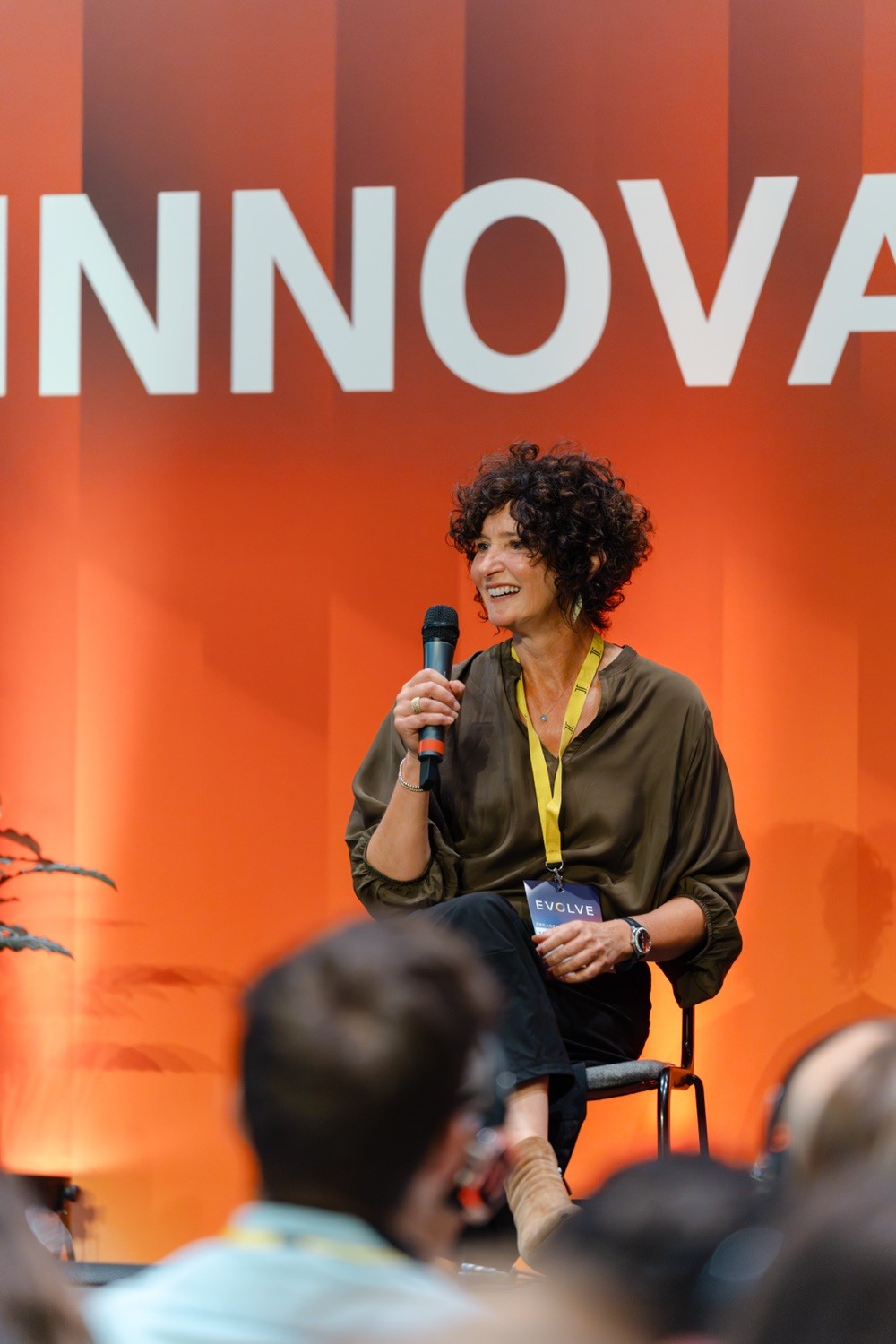 Guest speaker being interviewed on stage at Evolve 26 tech and innovation event