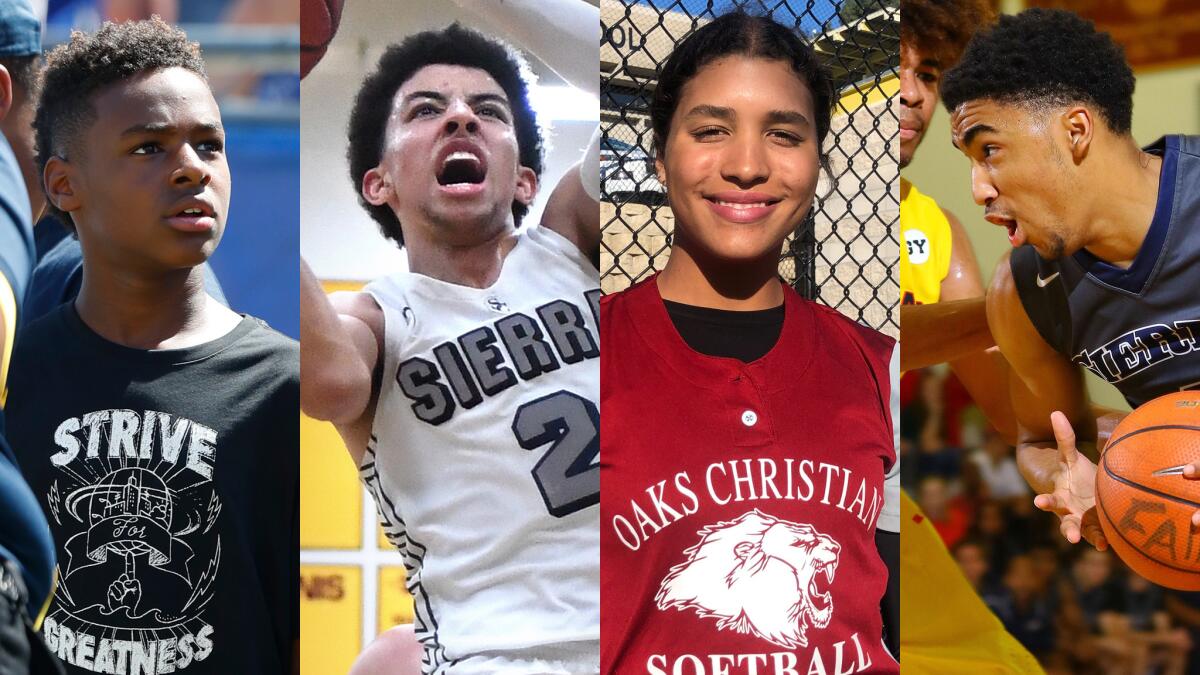 a group of children sitting on steps in front of a building