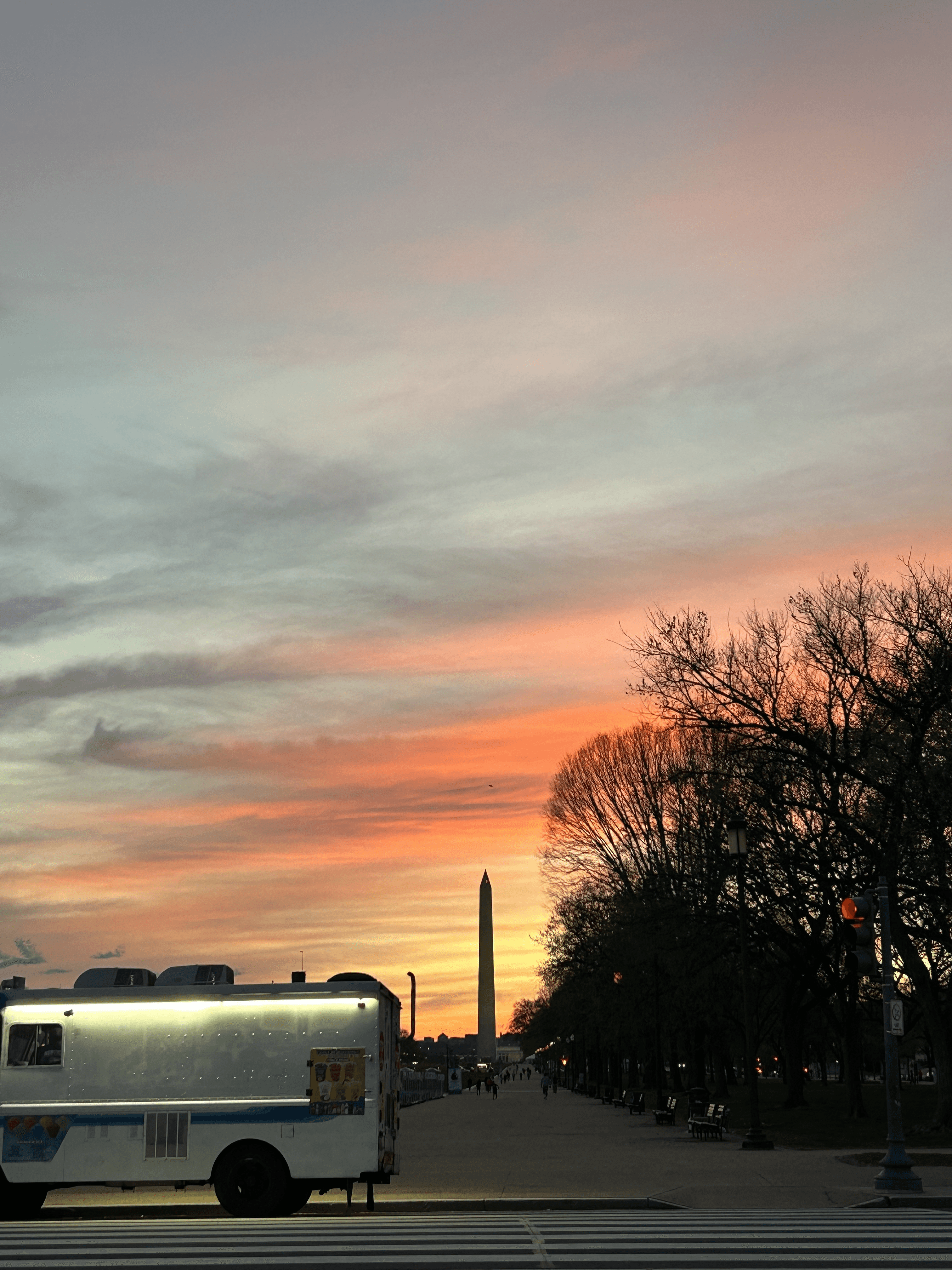 man filming on beach