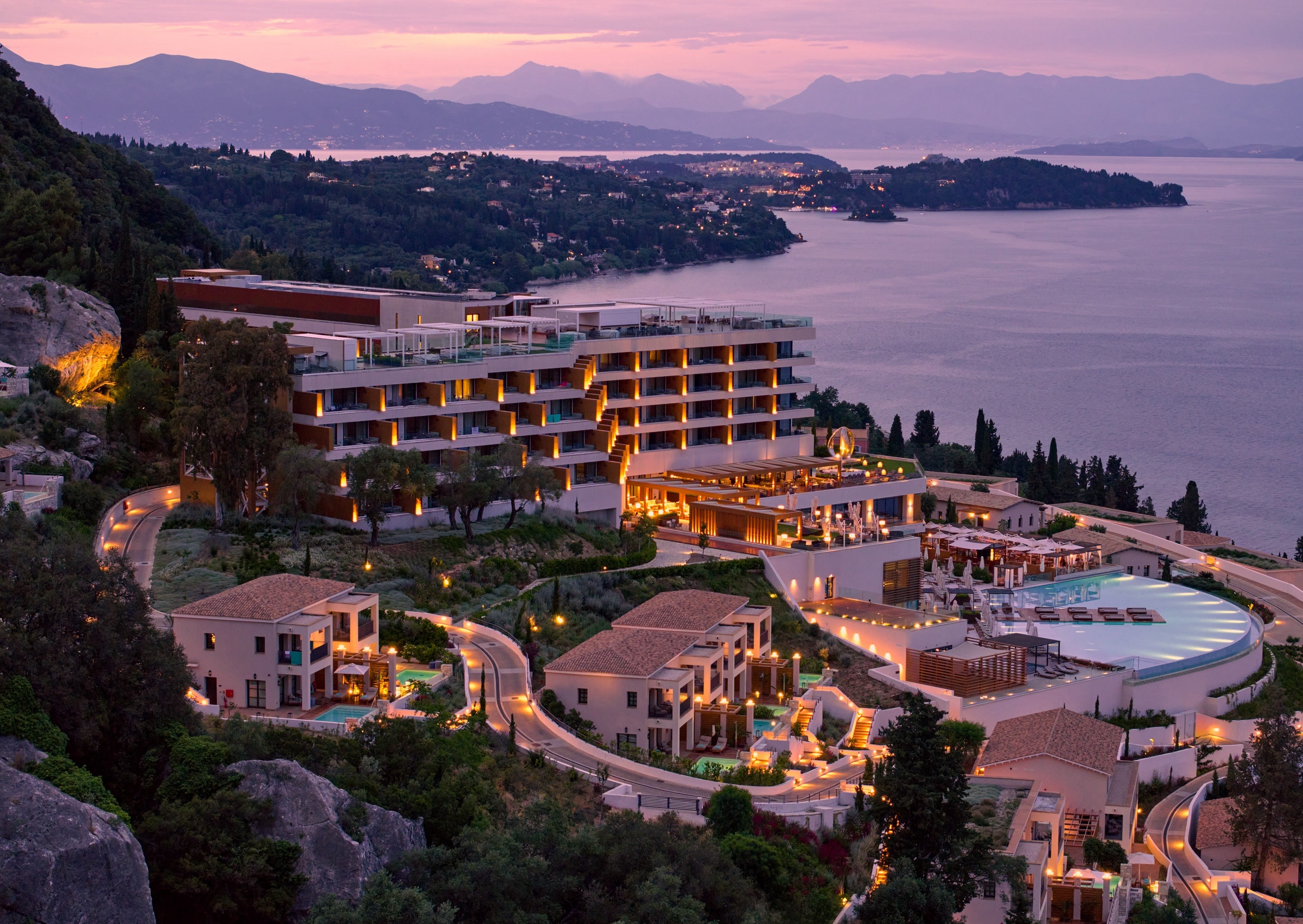 A group breathwork session in a tranquil indoor retreat space.