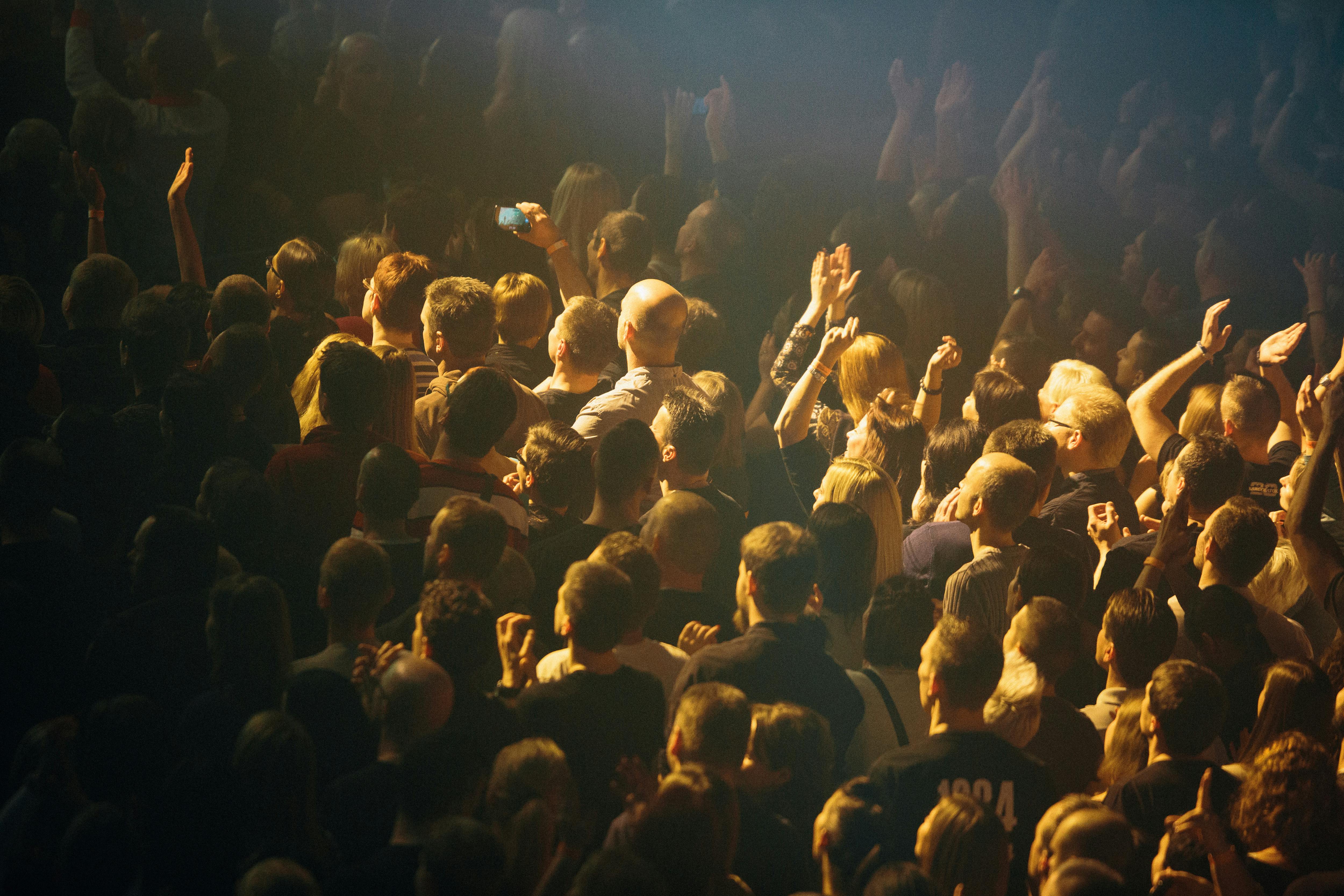 kids lying on a glass land and smiling