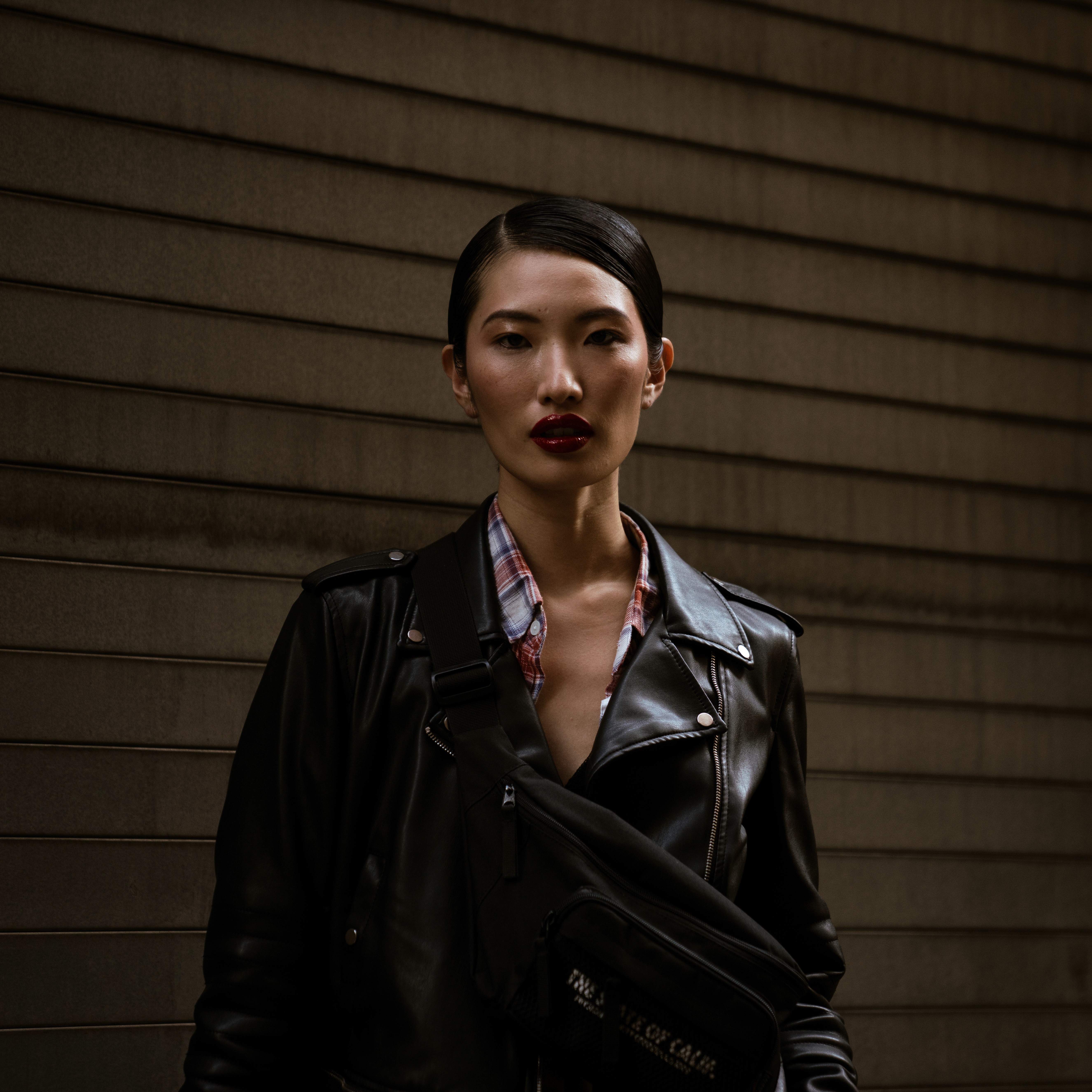 Stylish model poses outside Spring Studios in Soho