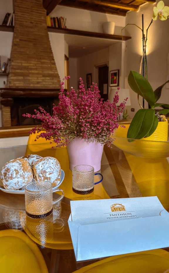 Dark wood console table with tall blue vases