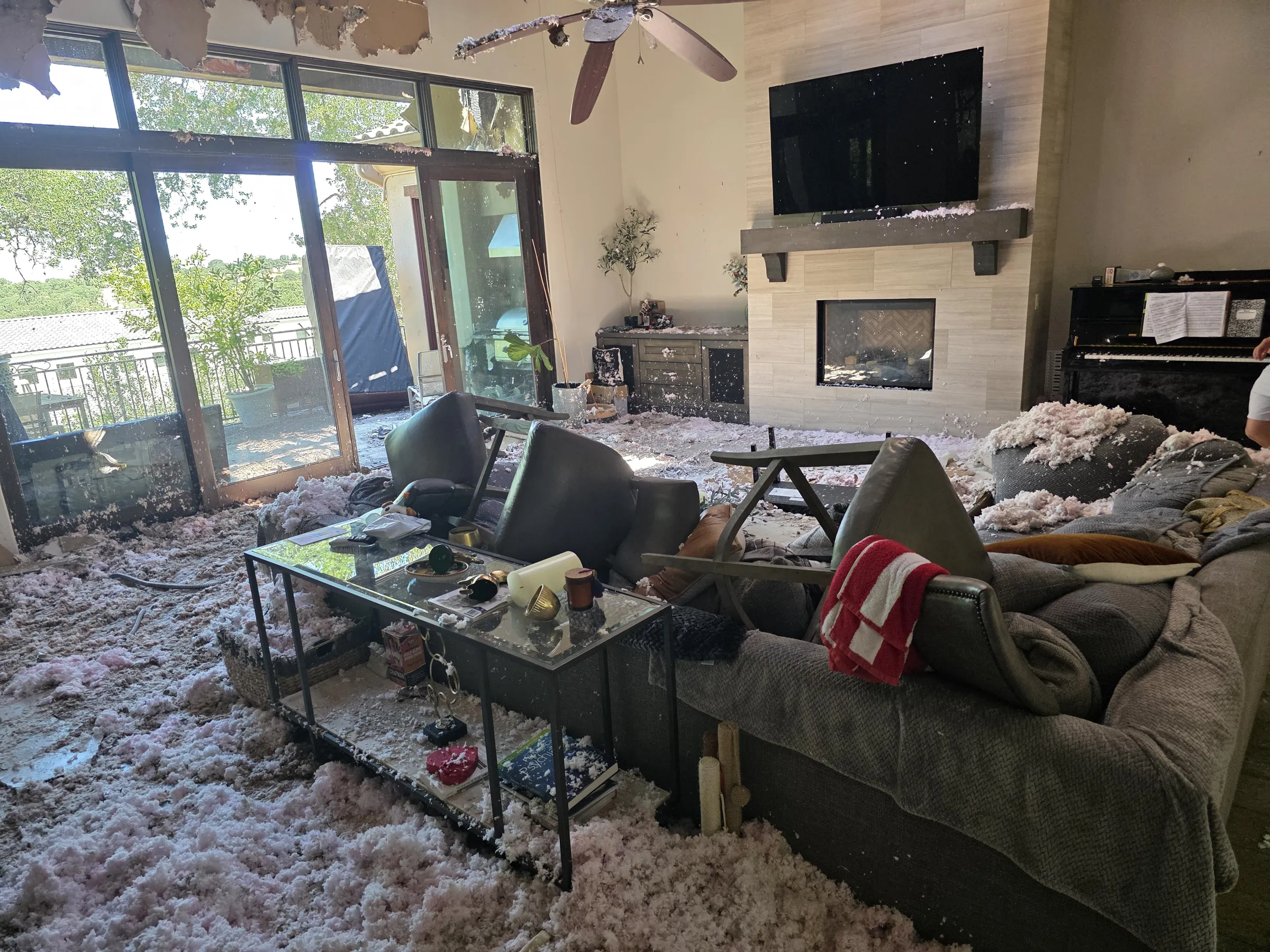 Fire-damaged living room before ERC cleanup and rebuild