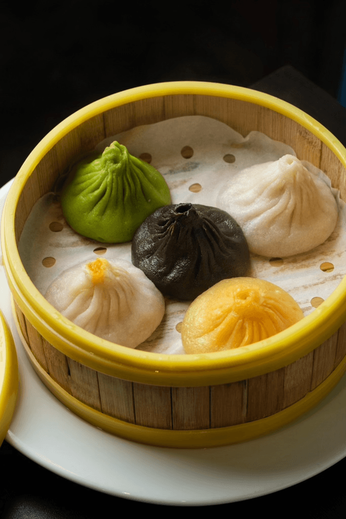 A vibrant platter of handmade dumplings at The Bund, highlighting the authentic flavors of Shanghai in the heart of Brooklyn.