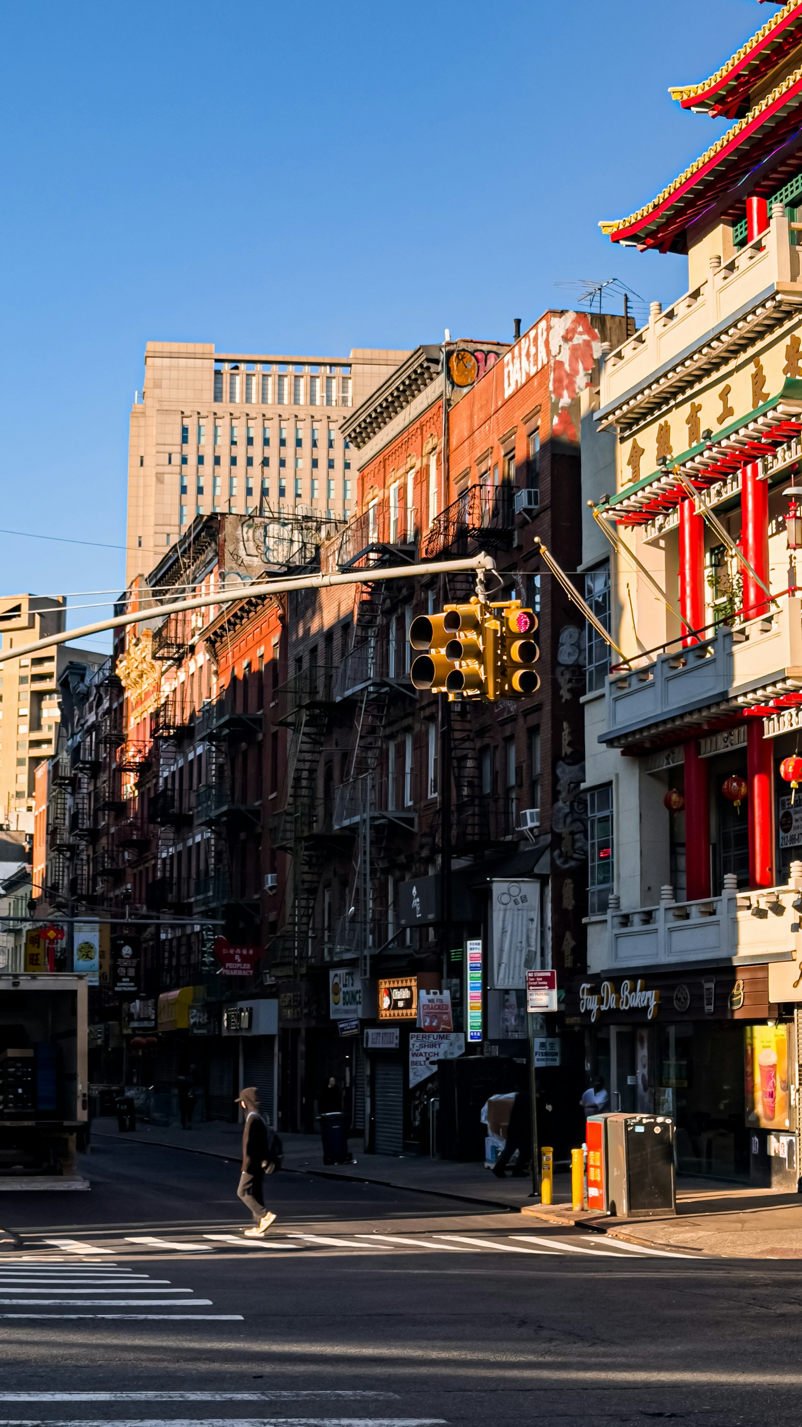 Street scene in chinatown with traditional architecture — editorial culture image 8 for "Sunday in Alfama"