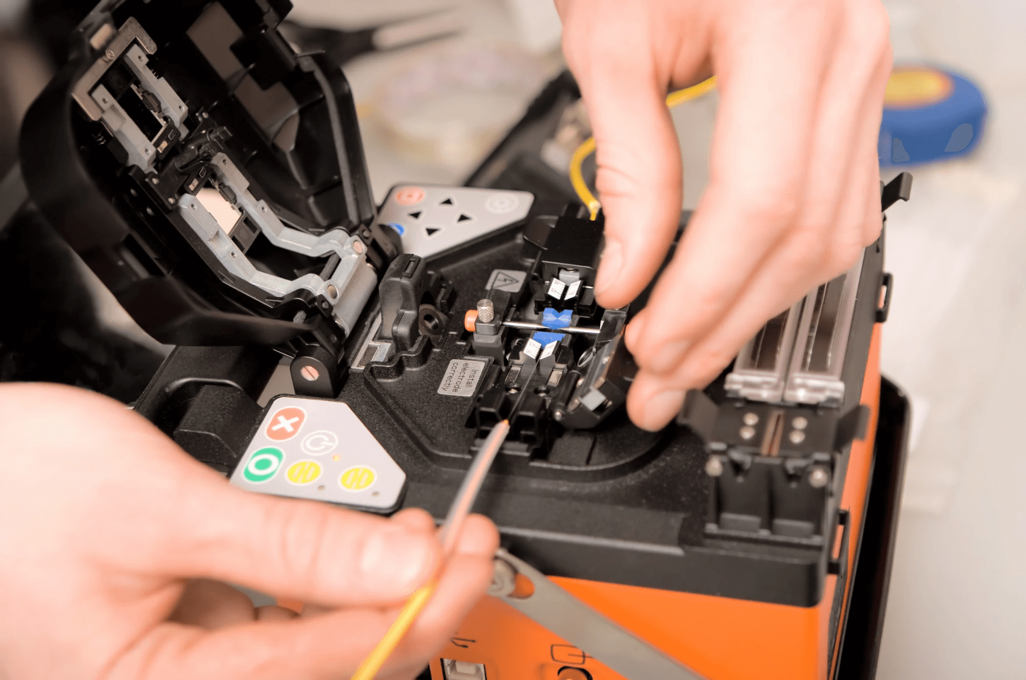 People collaborating on a hands-on technical training project