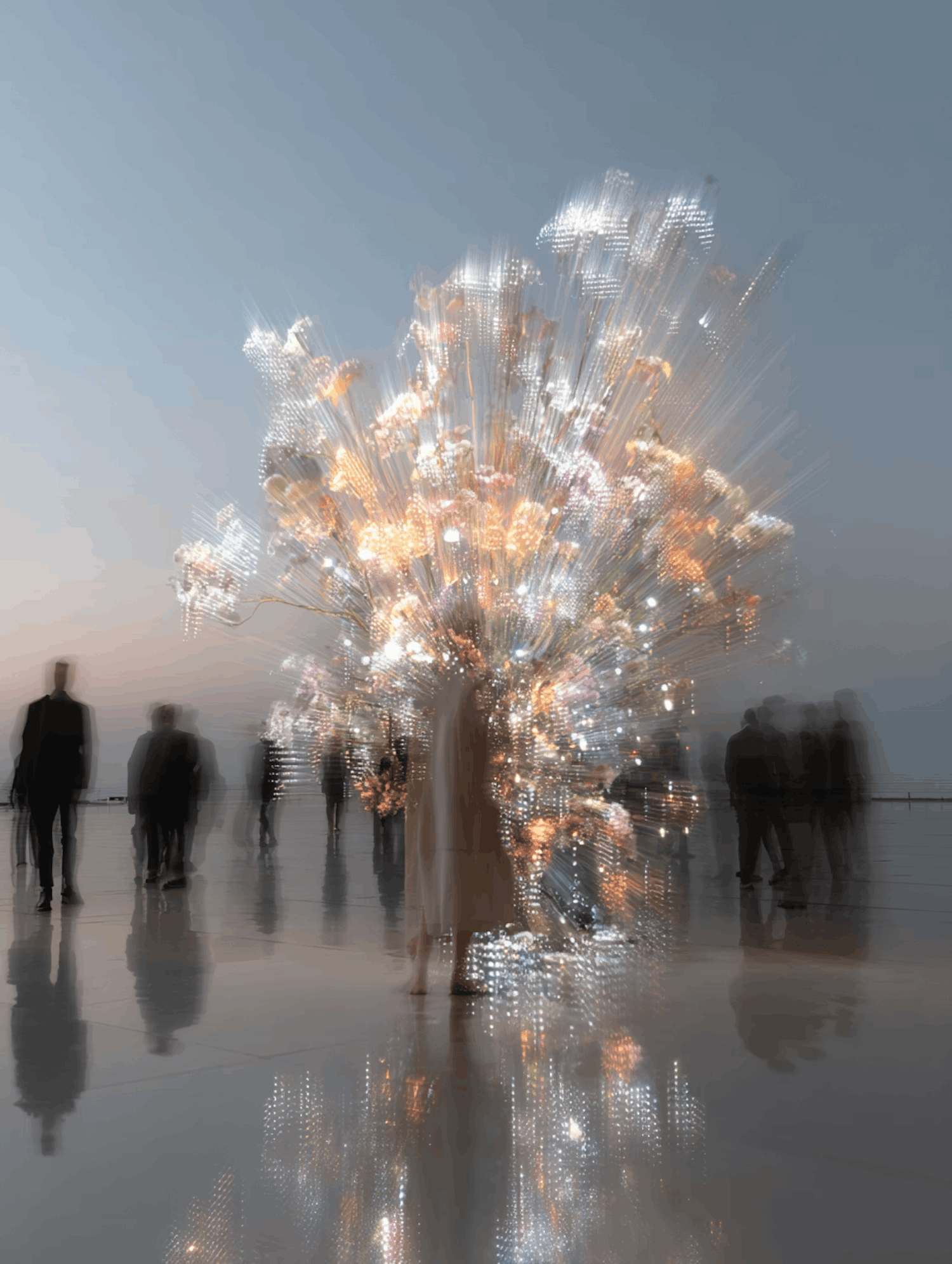 Decorative white blossom tree installation in a modern space.