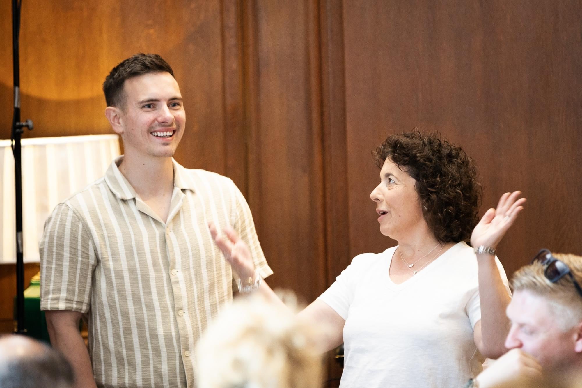 A conversation at an Orange & Gray Inner Circle event