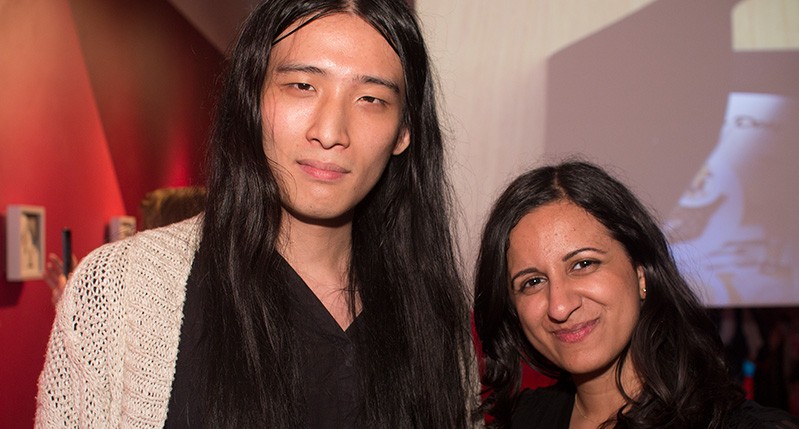 two people with long hair