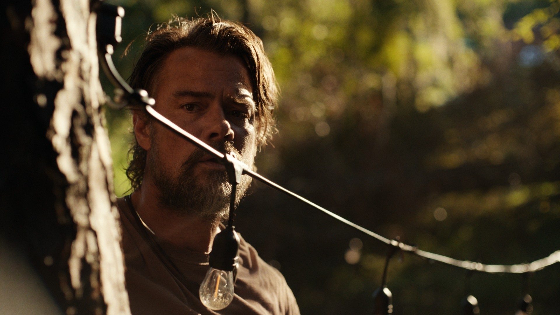 Vintage record player with blue vinyl, New Yorker poster, and ski poster.