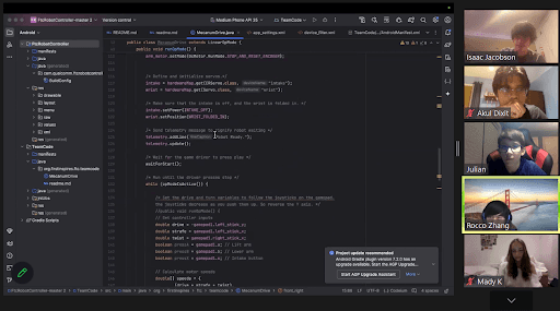 A modern green chair with a curved design and dark wooden legs against a dark background.