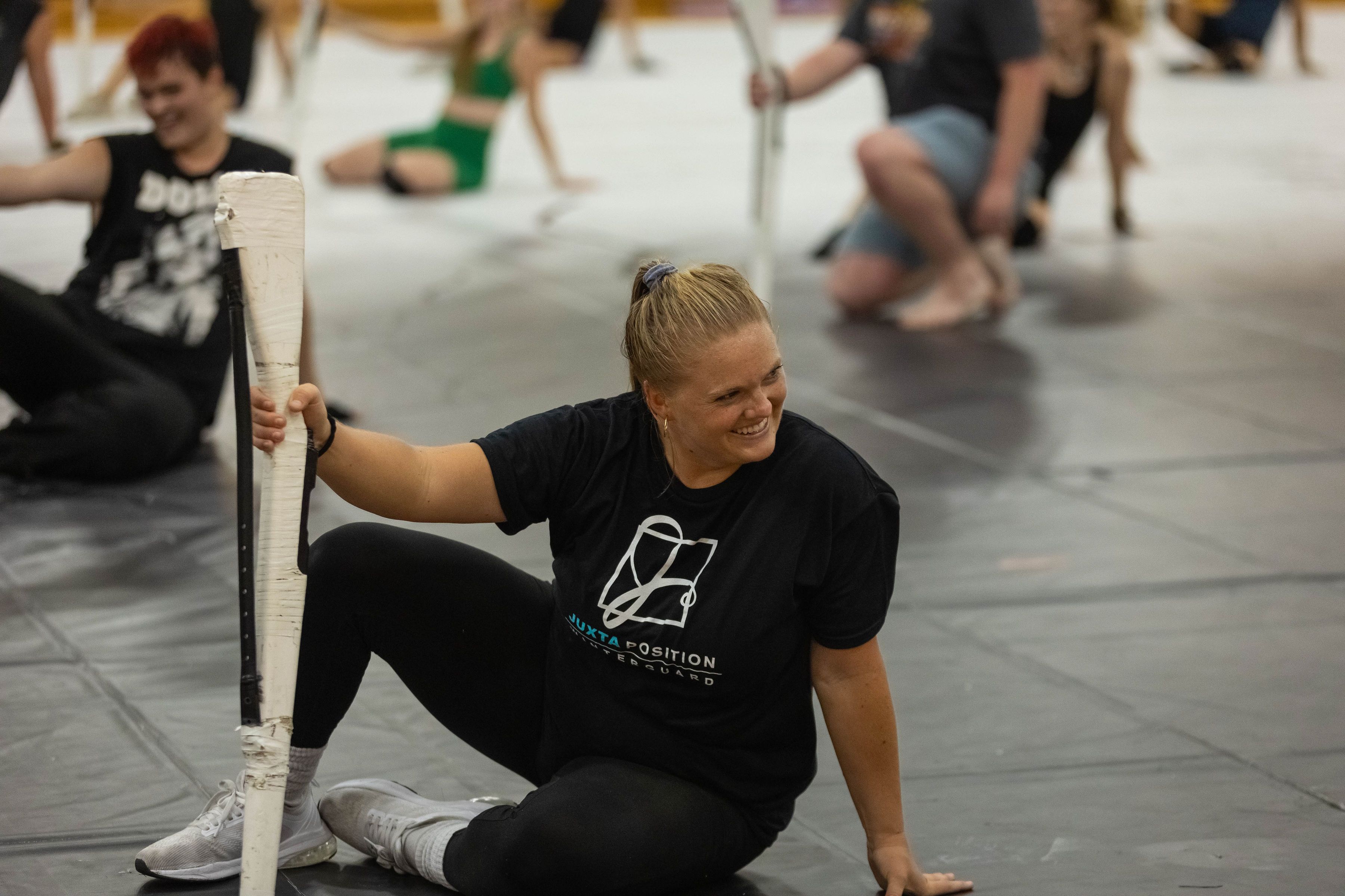 A Juxtaposition choreogrspher smiling teaching a clinic lesson.