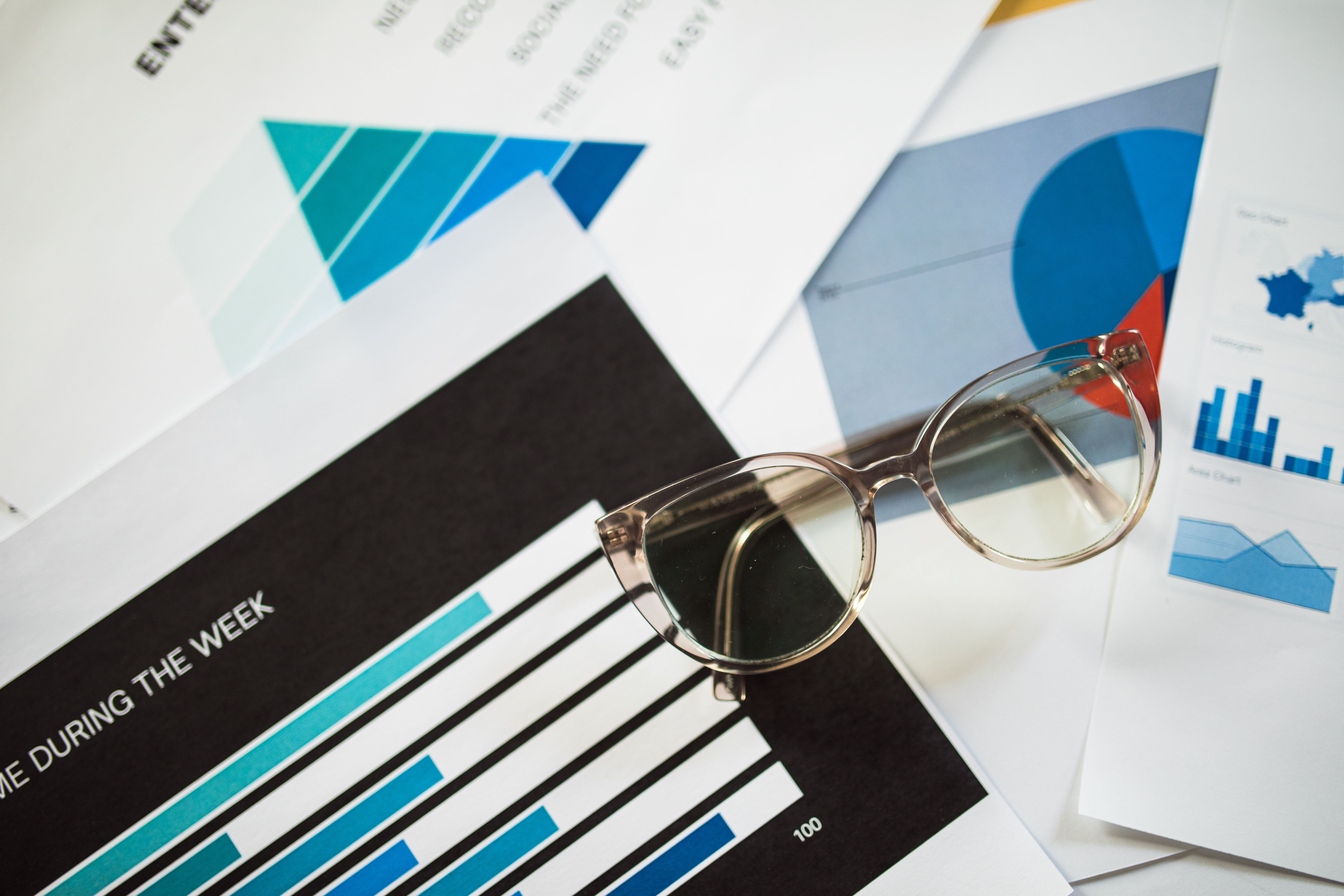 close-up-of-eyeglasses-resting-on-financial-documents-with-various-charts-and-gr - rdne-stock-project (pexels)