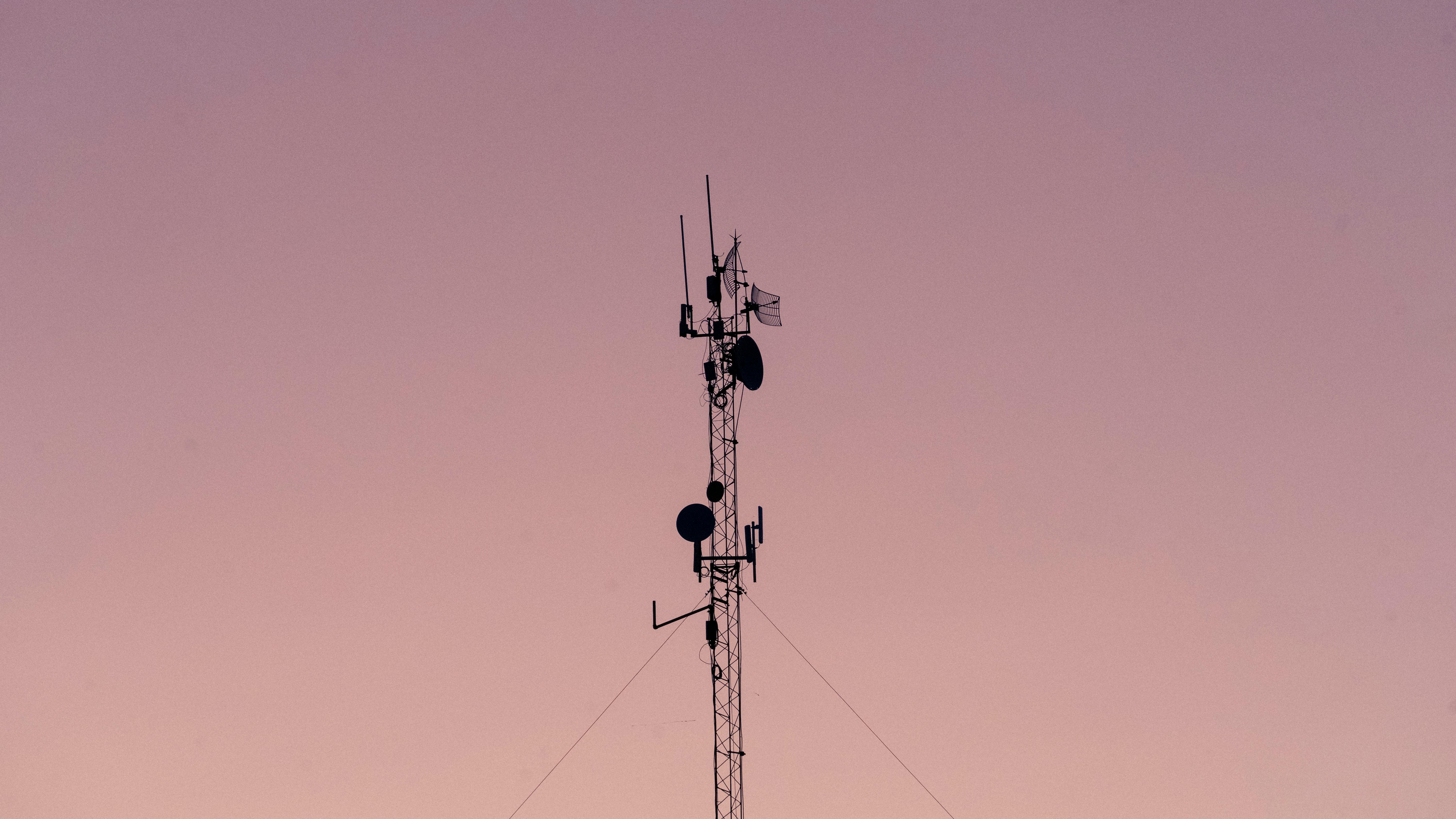 a-tall-telecommunication-tower-silhouetted-against-a-clear-dusk-sky. - mario-amé (pexels)
