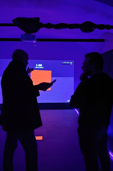 Visitors explore the projected Byte Room data environment.