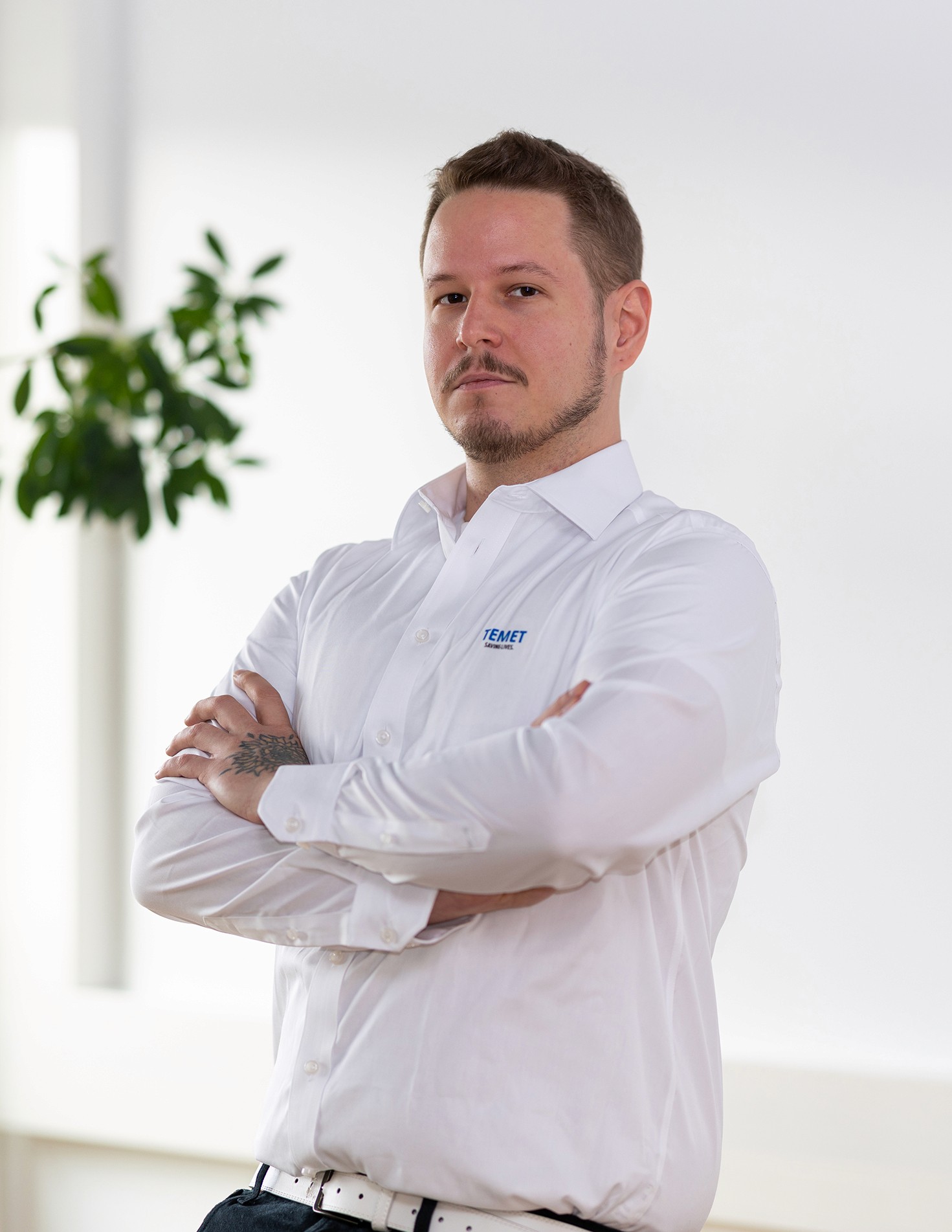 Portrait of John Doe Anderson, CEO of Omnis.