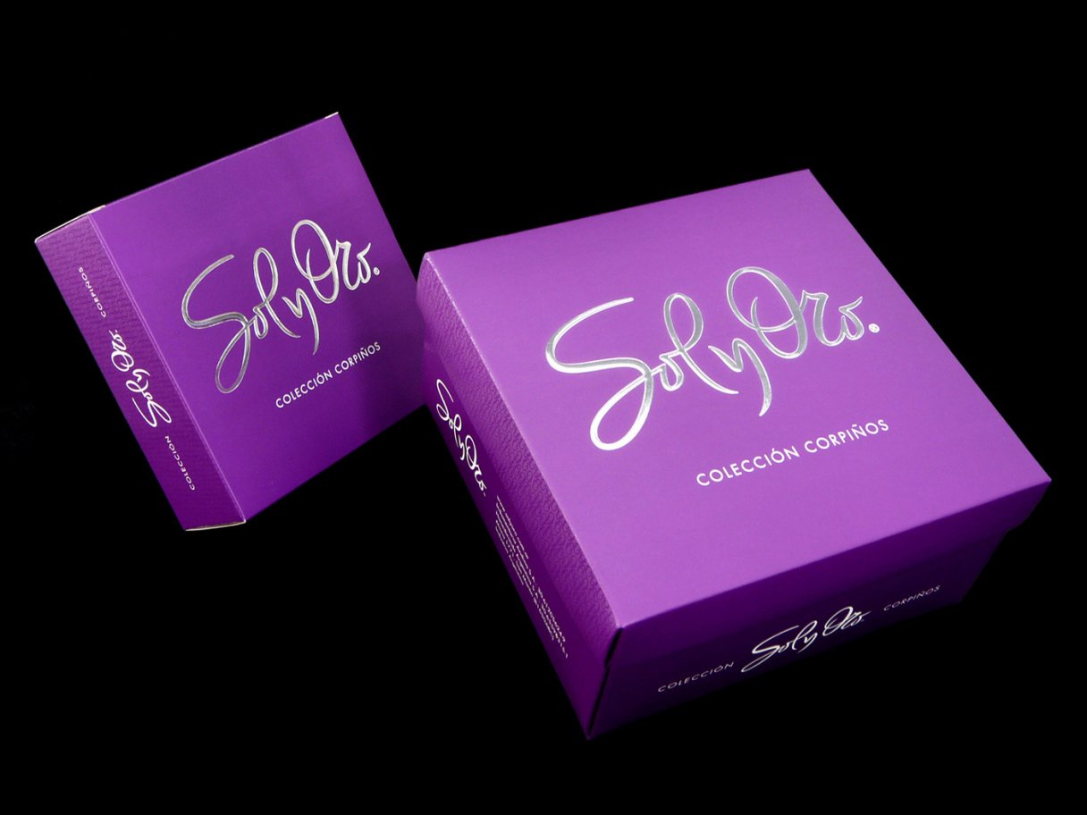 Rooftops of a coastal town with the sea in background