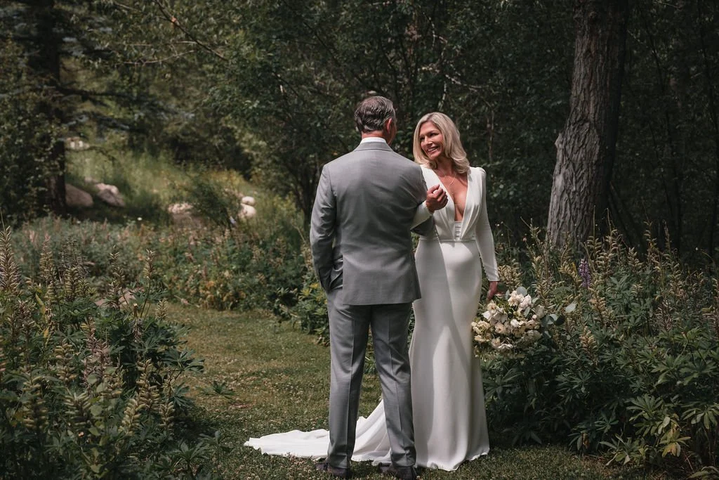 Newlyweds walking down aisle after Bosq Aspen wedding ceremony