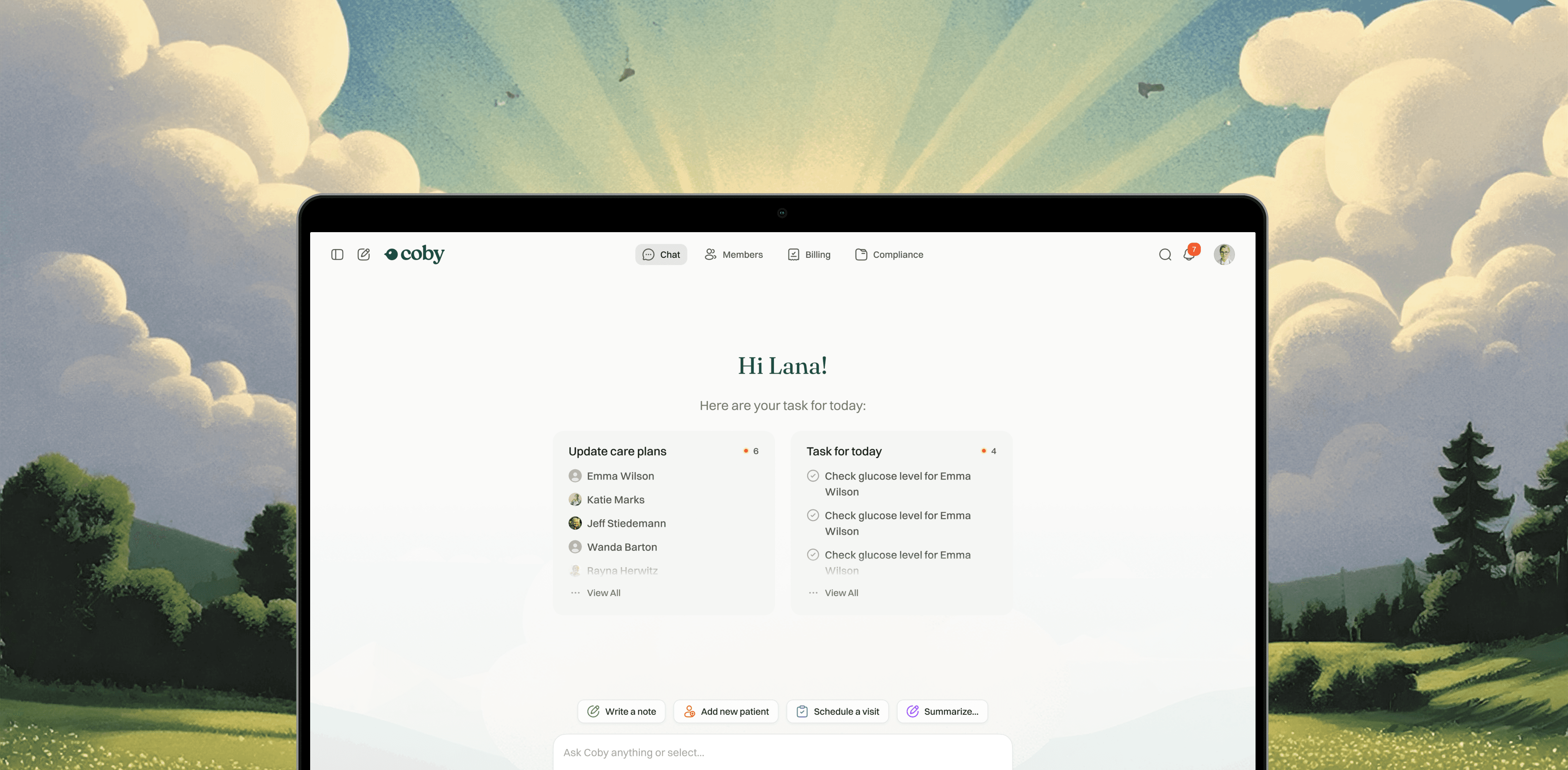 A laptop screen displays a minimalist interface with a scenic landscape background featuring sun rays.