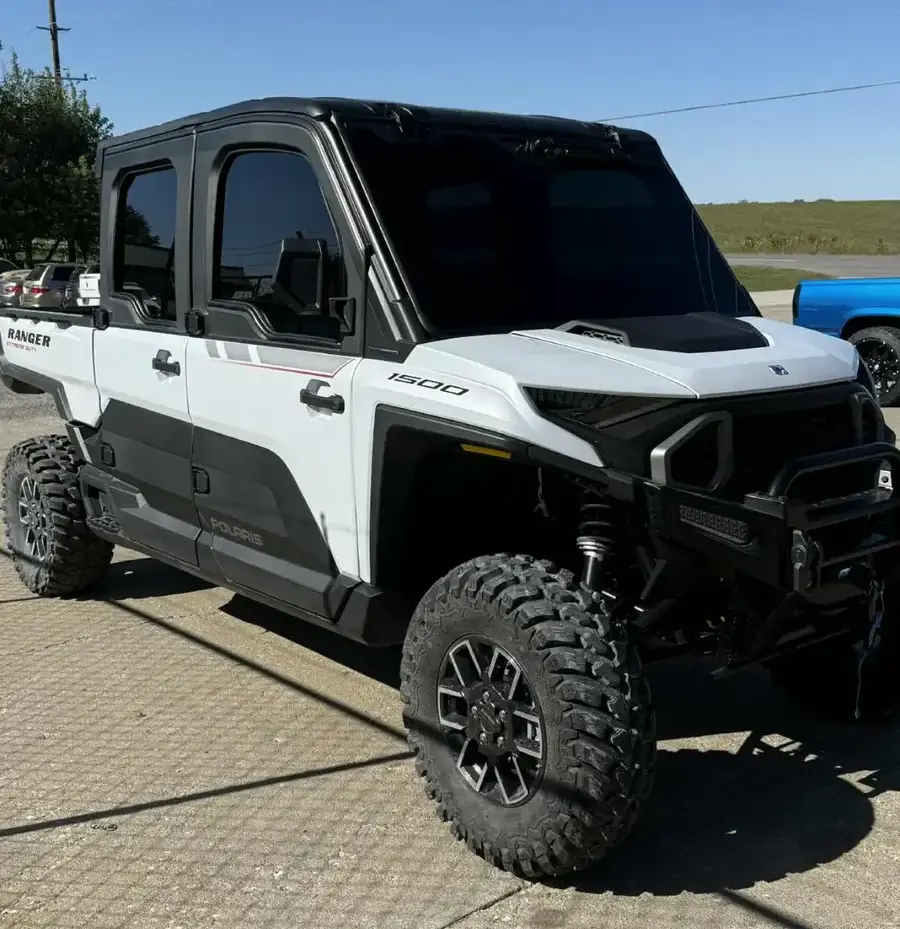 White cart outdoors with tinted windows