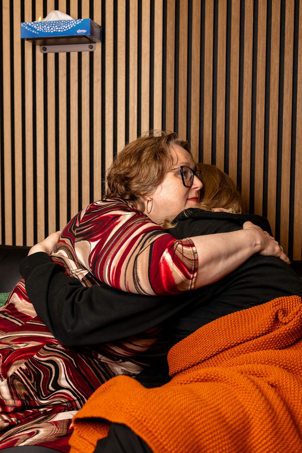 Female yoga instructor teaching a client
