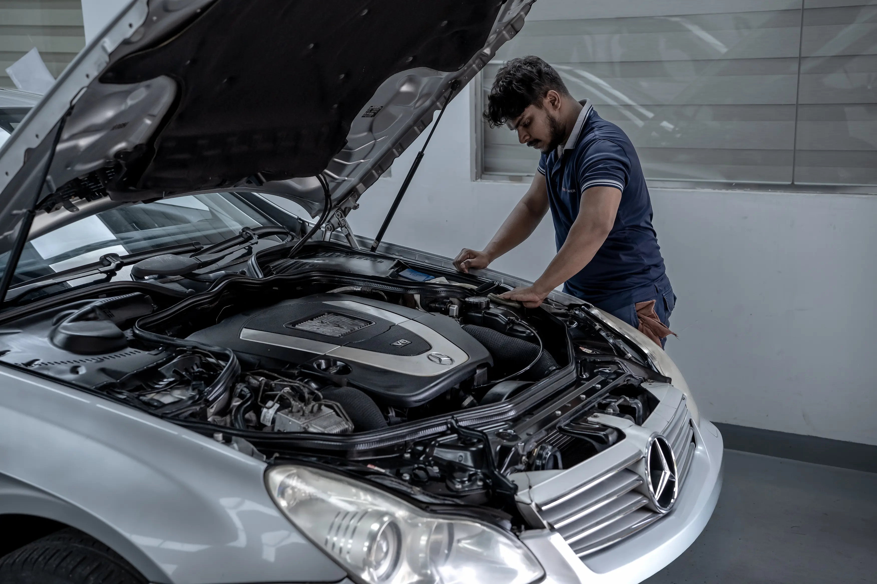 Person doing mechanical services